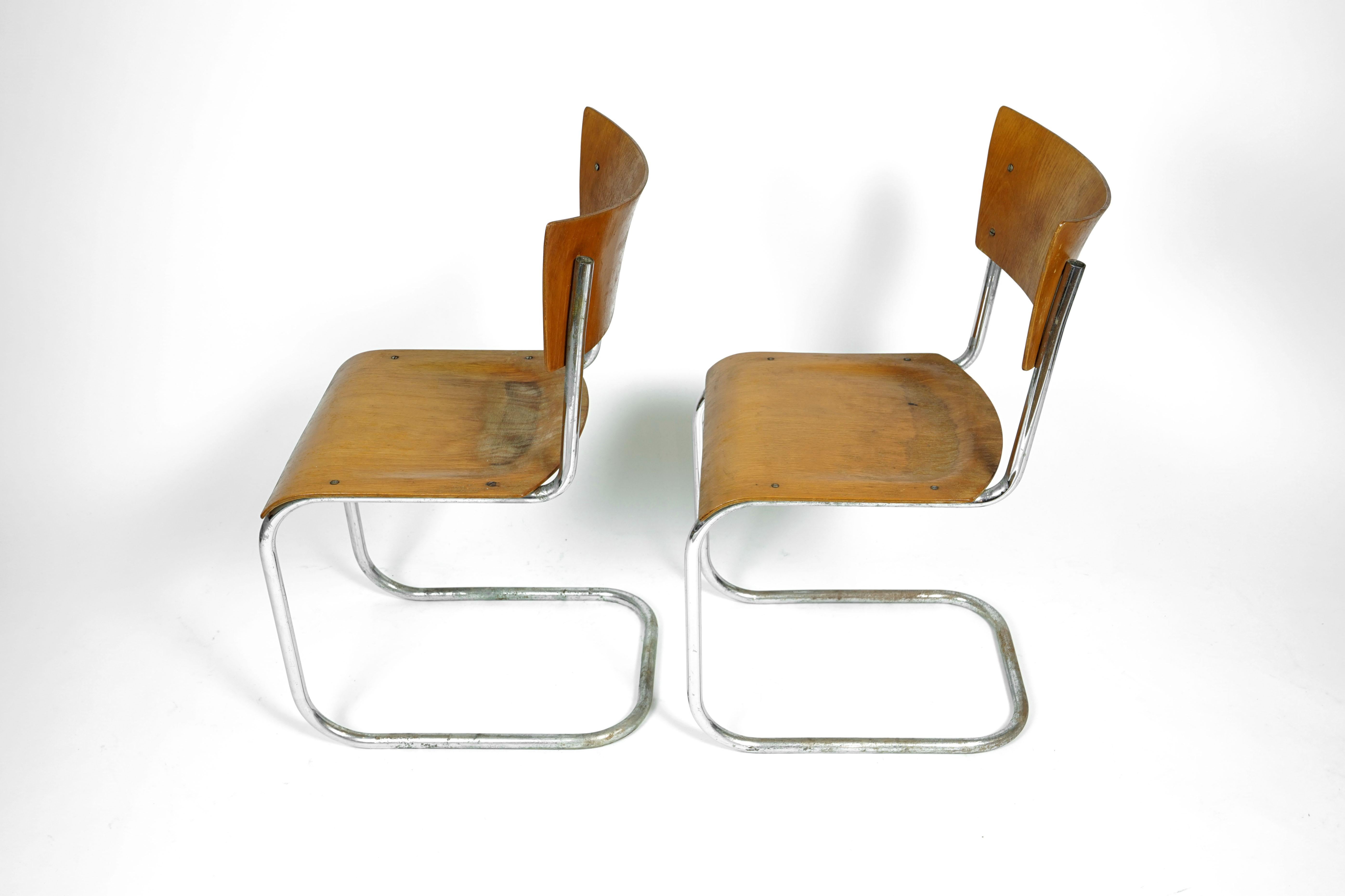 Set of two Bauhaus Cantilever chairs. Designed in late 1920s by Mart Stam and manufactured by Thonet. The chairs are in it's original condition!