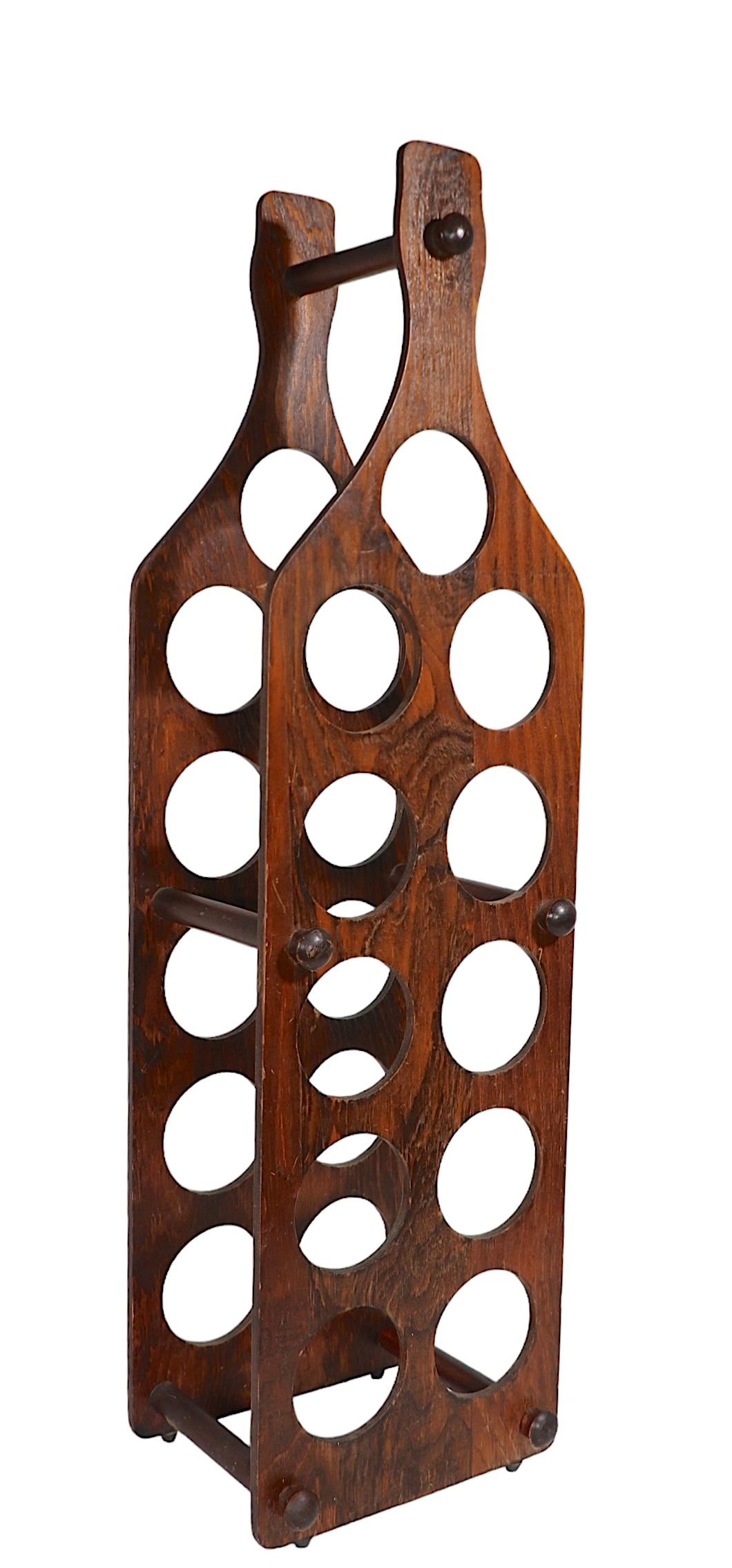 American Plywood Wine Rack in the form of a Wine Bottle holds 11 Bottles c 1970's For Sale