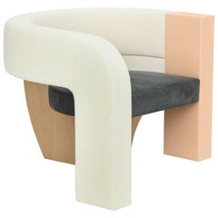 Fauteuil PnKrck de Kelly Behun & Narciso Rodriguez, en daim et chêne laqué