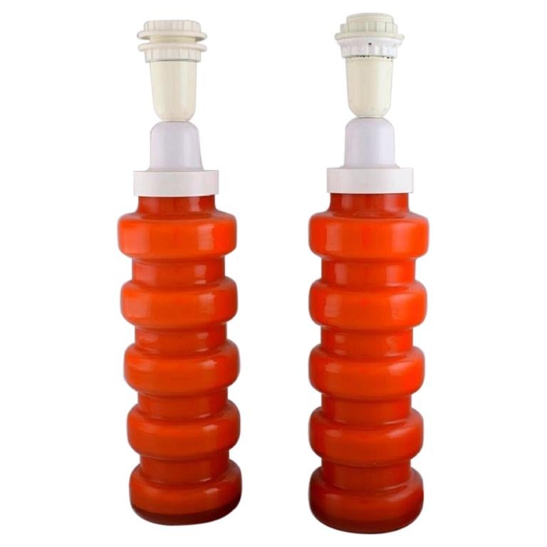 Po Ström for Alsterfors, Two Table Lamps in Orange Mouth-Blown Art Glass For Sale