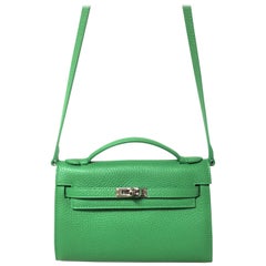 Pochette green leather with shoulder strap 