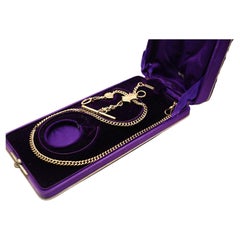 Taschenuhrkette 56 Gelbgold Lila Schachtel, 1900