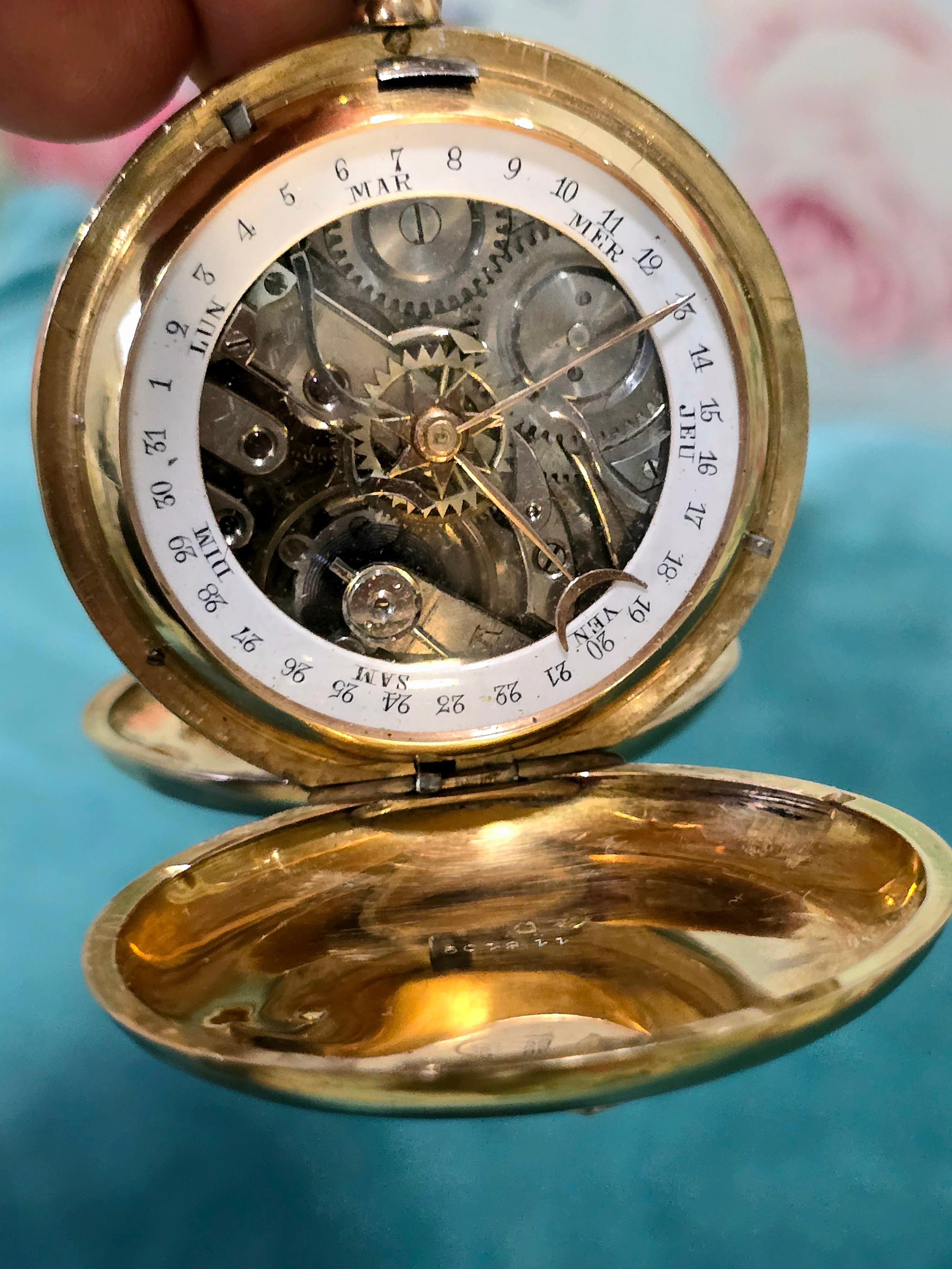 Taschenuhr aus 18 Karat Gold, datiert aus der Zeit um 1900 mit Kalender im Angebot 6