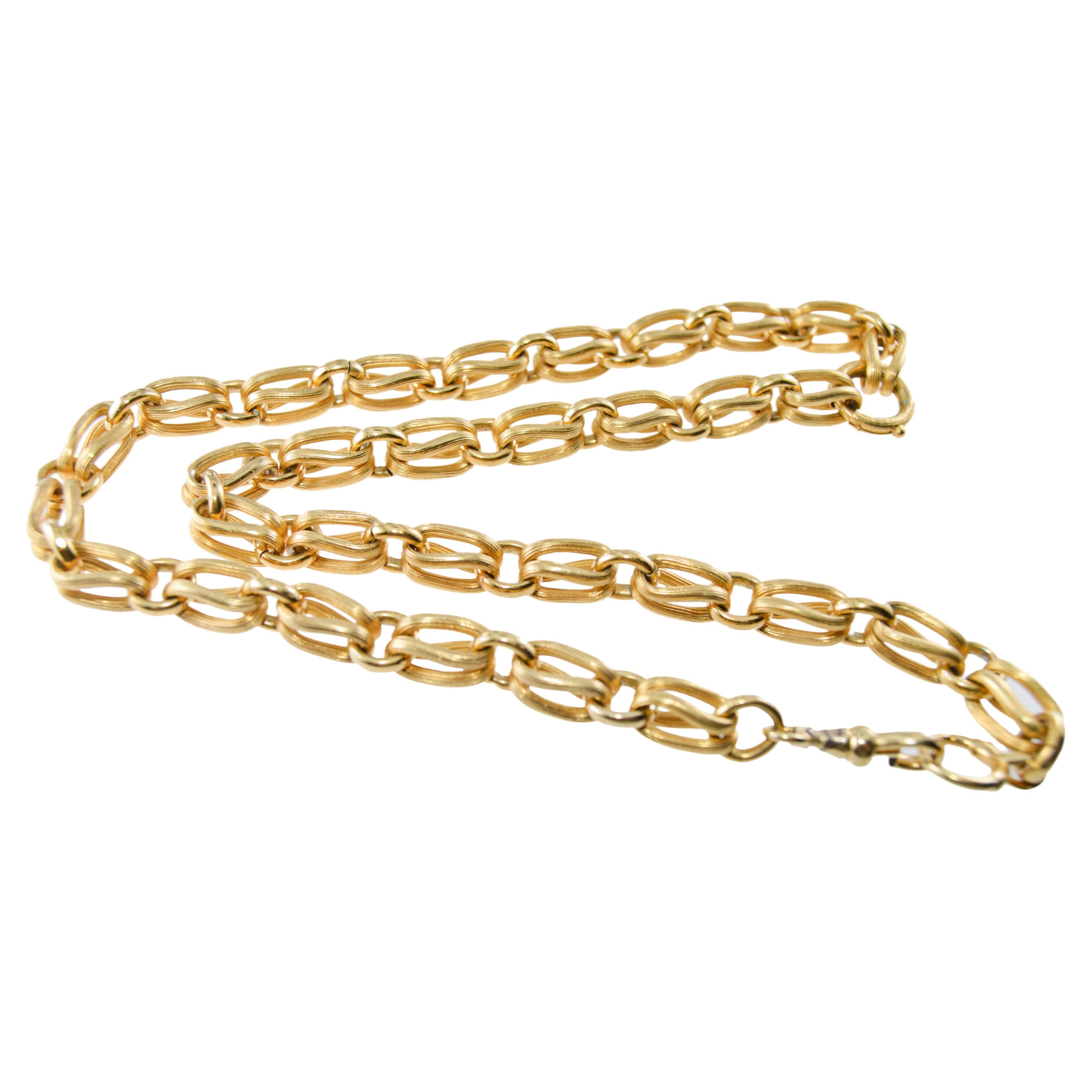 METAL / MATERIAL: Yellow Gold Filled 
CIRCA / YEAR: 1920's
DIMENSIONS / SIZE: 21 Inches Total Length / 3/8 Thick  

This is a very unique Pocket Watch Chain set up as two chains. It can be worn with a pocket watch or for two pocket watches, or as a