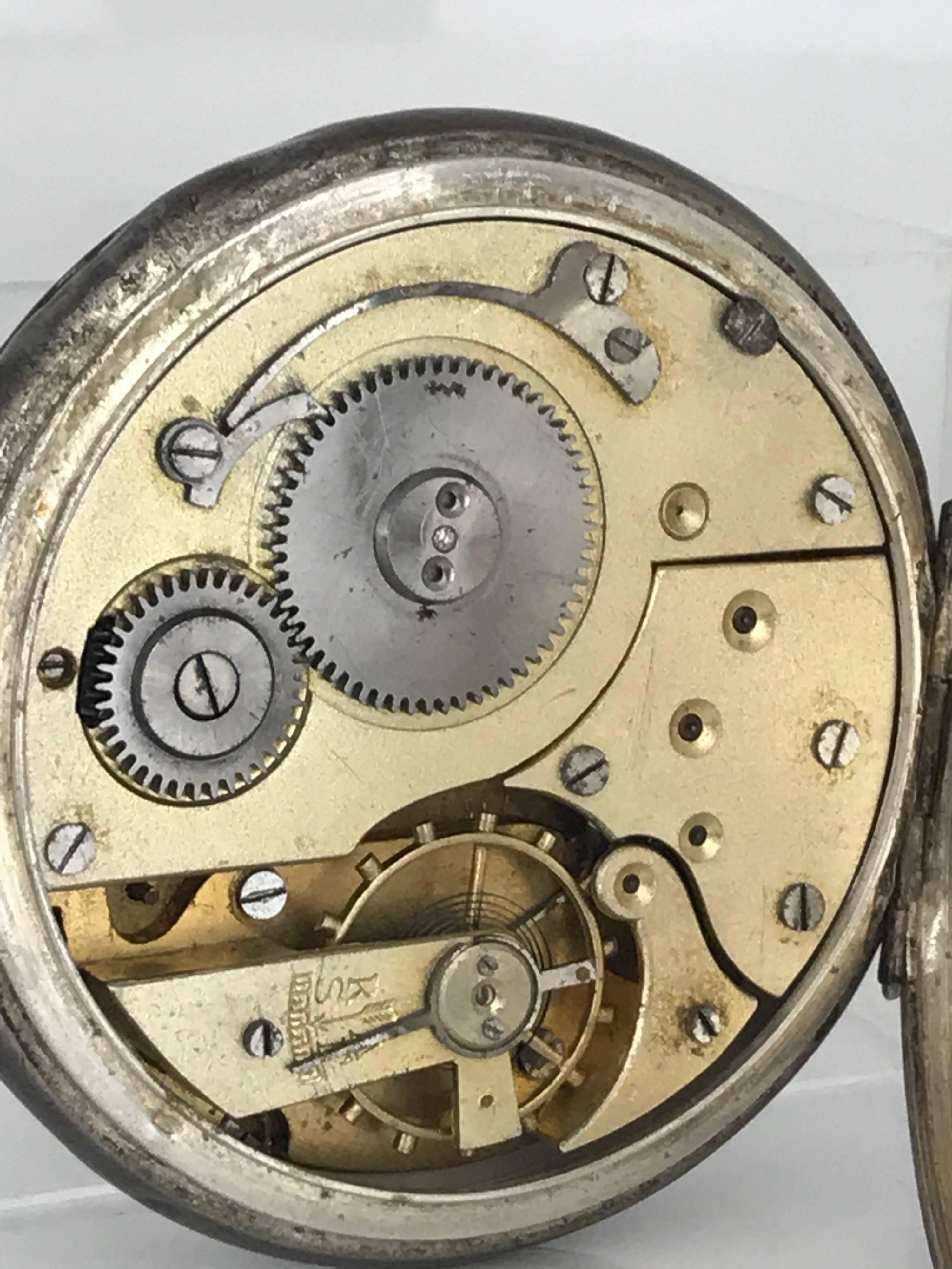 Sterling Silver Antique Pocketwatch Reguateur Veritable Echappement Roskopf Oversized Railroad Half Hunter

Very cool old estate watch with a round white ceramic face, roman numerals and a 2nd hand dial.

Back of watch features a magnificently