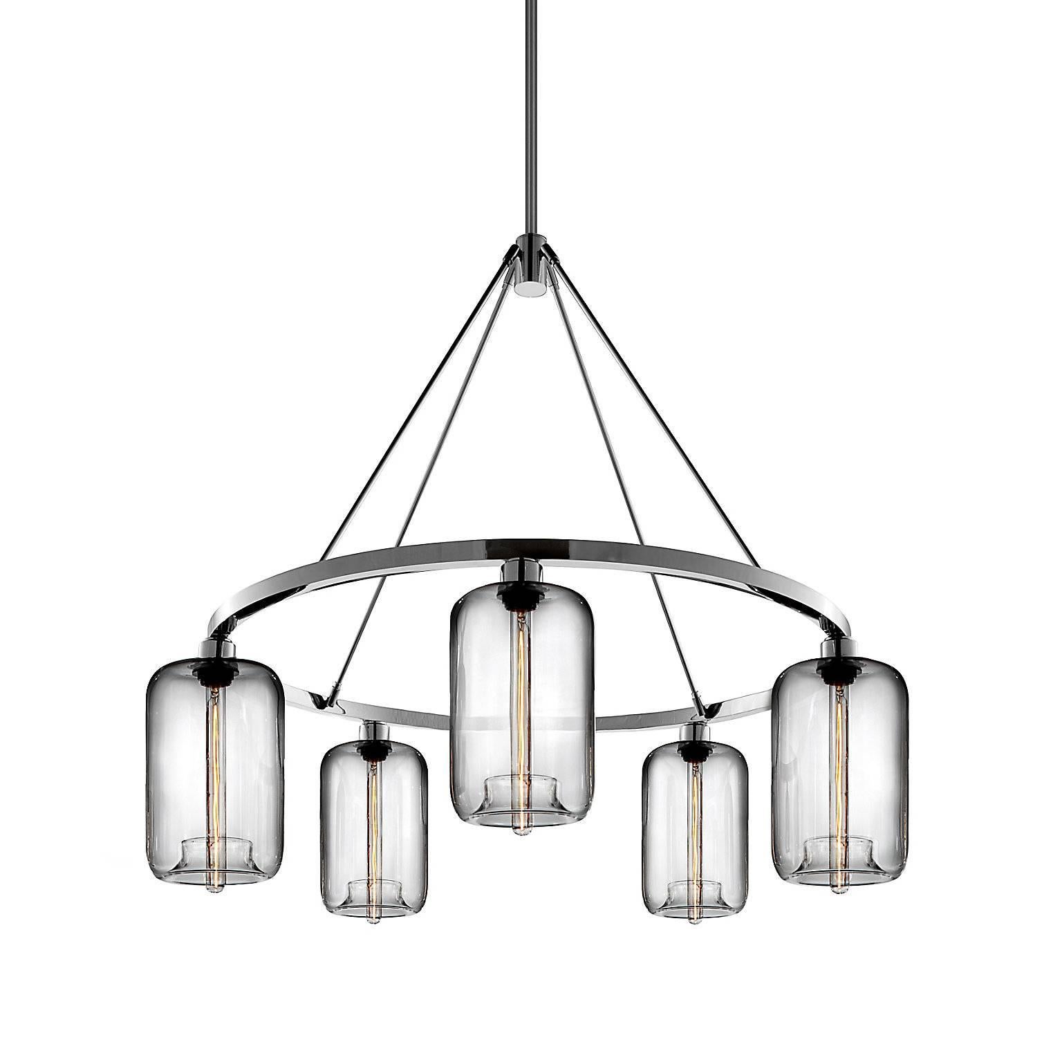 A statement piece designed to attract attention to the brilliant Pod pendant, this chandelier captivates as it suspends elegant handblown shades. Every single glass light that comes from Niche is handblown by real human beings in a state-of-the-art