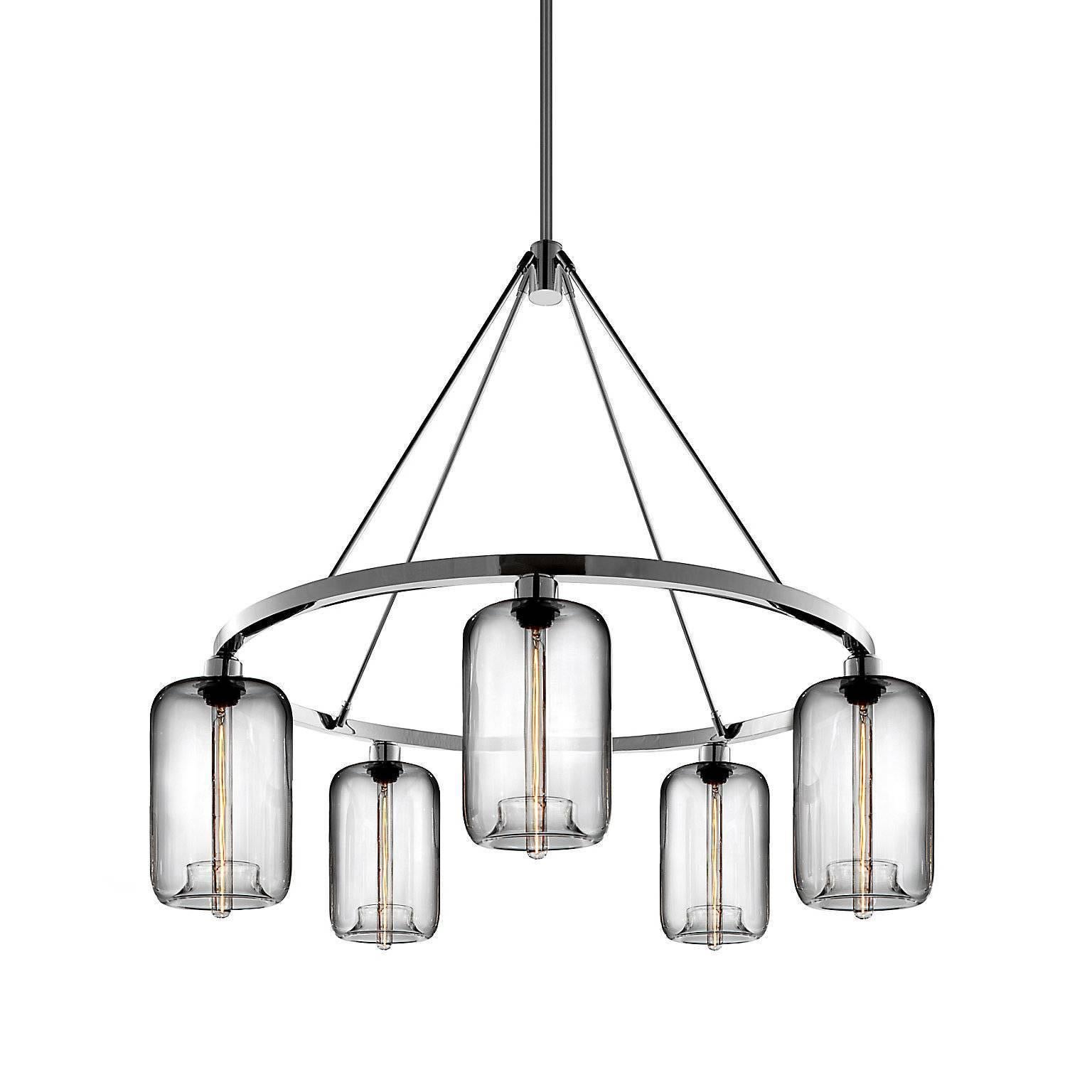 A statement piece designed to attract attention to the brilliant pod pendant, this chandelier captivates as it suspends elegant handblown shades. Every single glass light that comes from Niche is handblown by real human beings in a state-of-the-art