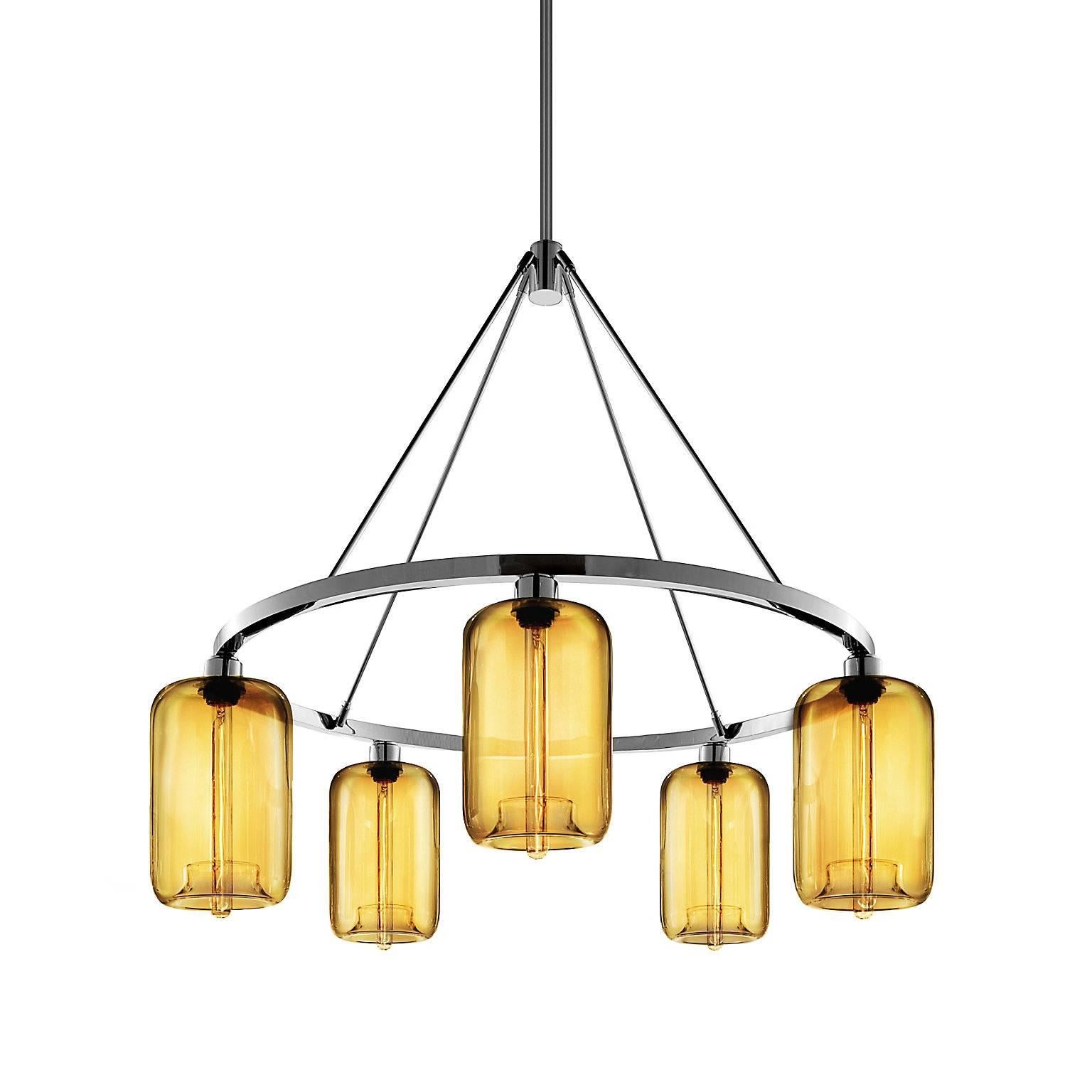 A statement piece designed to attract attention to the brilliant Pod pendant, this chandelier captivates as it suspends elegant hand-blown shades. Every single glass light that comes from Niche is handblown by real human beings in a state-of-the-art