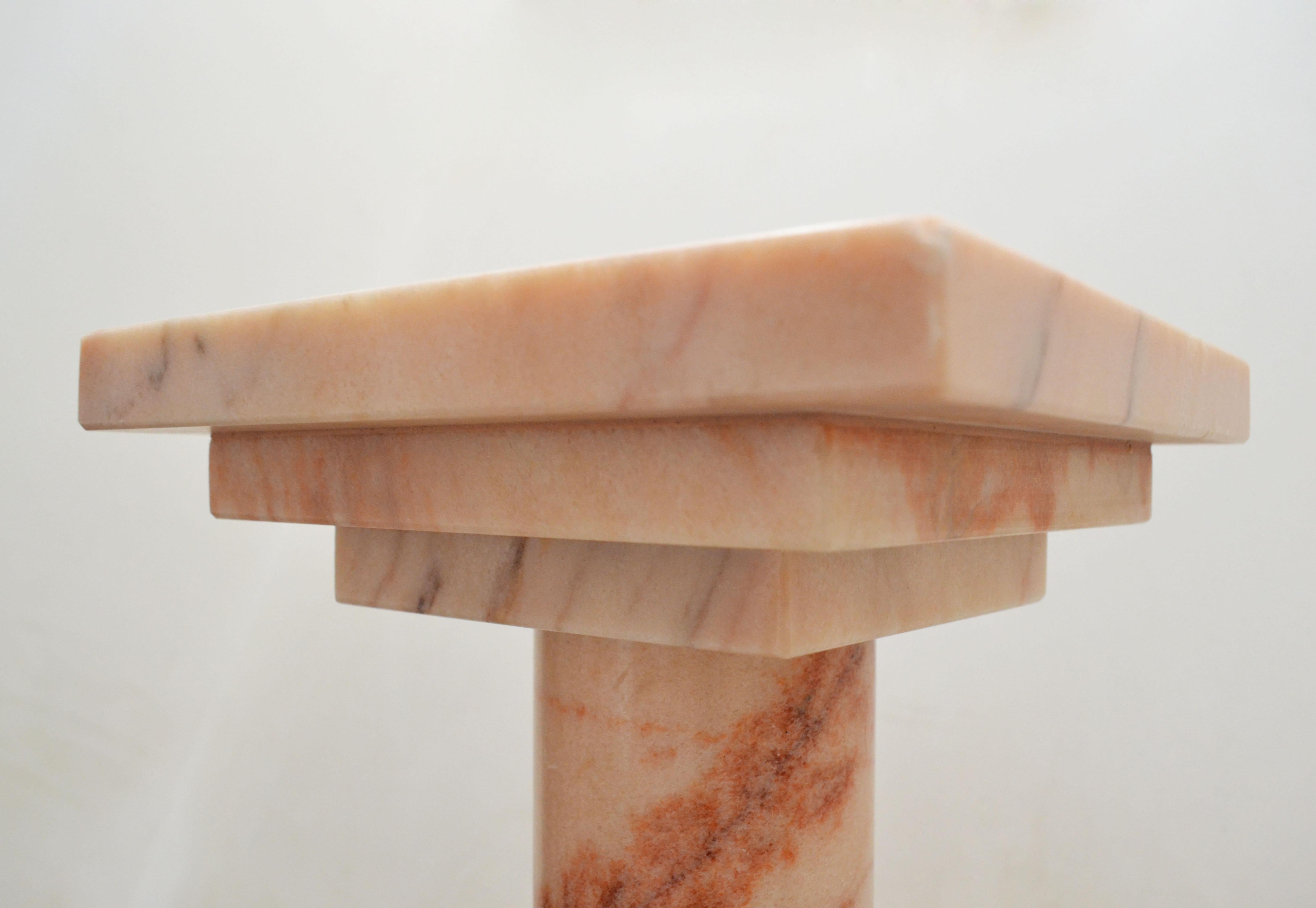 A marvelous podium - prefect to display a cherished item - or beautiful in its own right.

Crafted from a solid piece of Portuguese rose marble, this piece is ideal to add that something extra to your home.

Available in different colors to suit