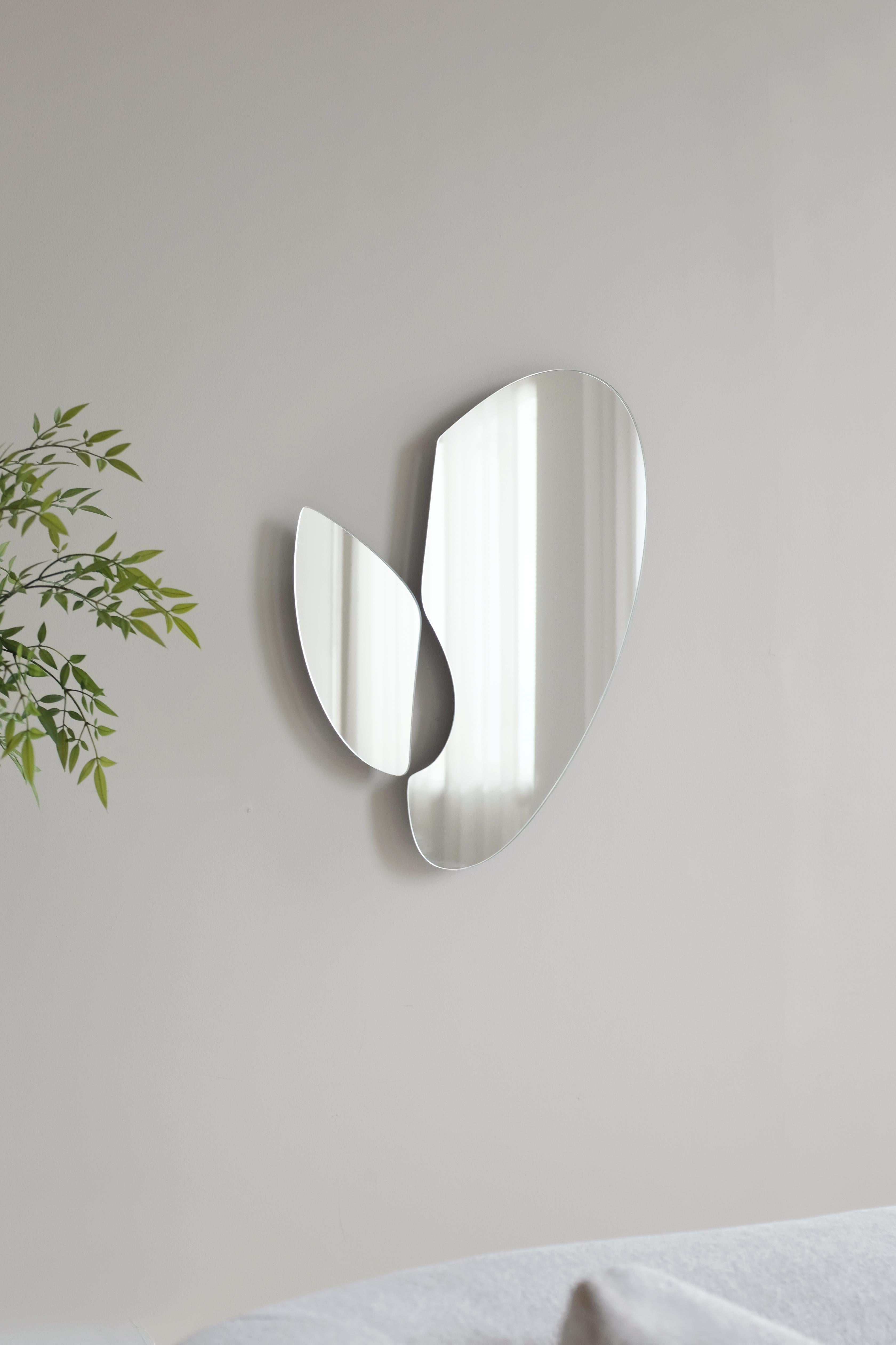 'Poet' by Soo Joo is an asymmetric organic wall mirror. It has a unique novel design, while simultaneously having a timeless beauty that can be enjoyed for decades. The artist creatively reimagines the essence of traditional Korean aesthetics into a