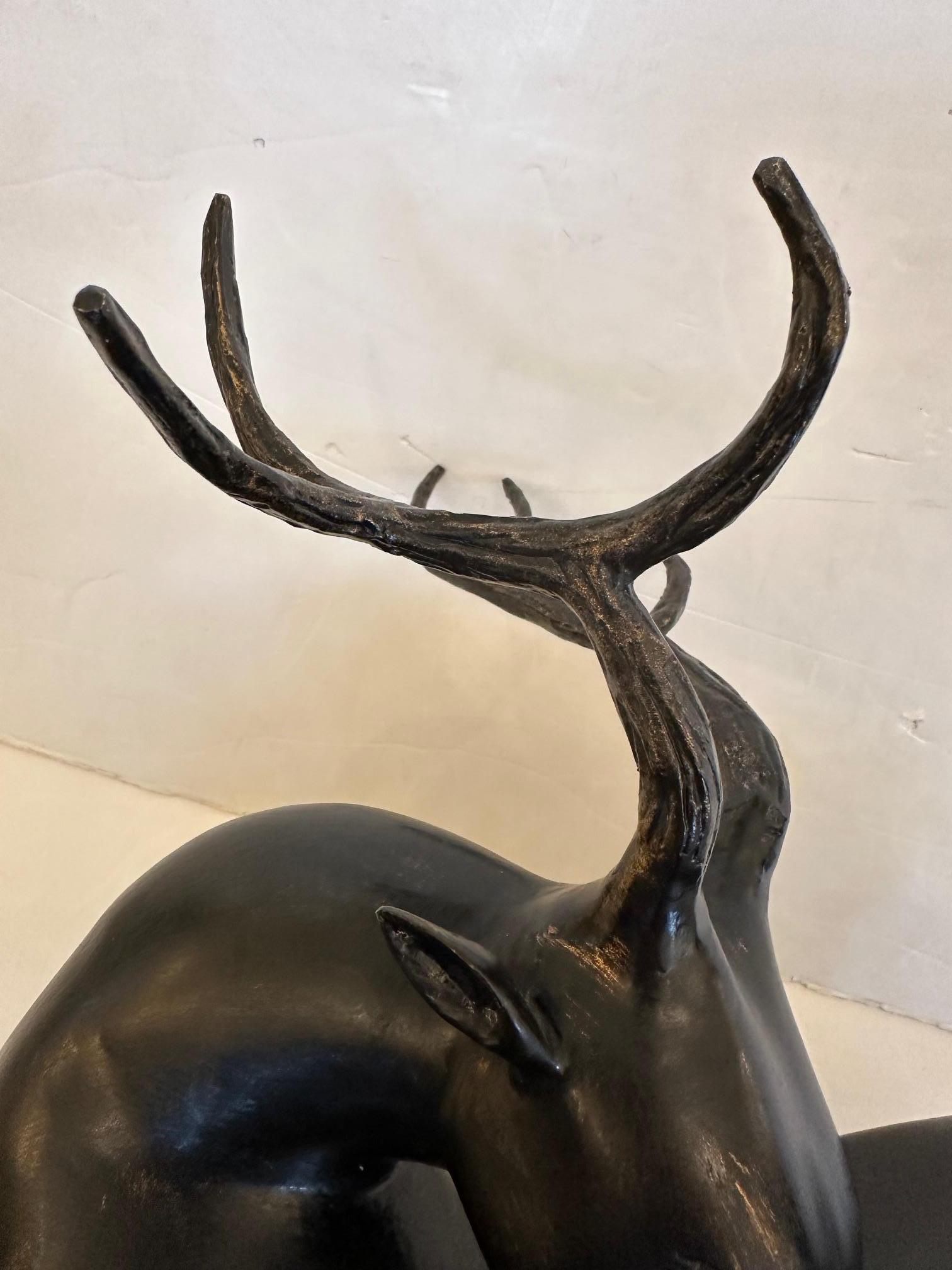 American Poetic Iron Sculpture of Recumbent Stag Deer on Wood Base For Sale