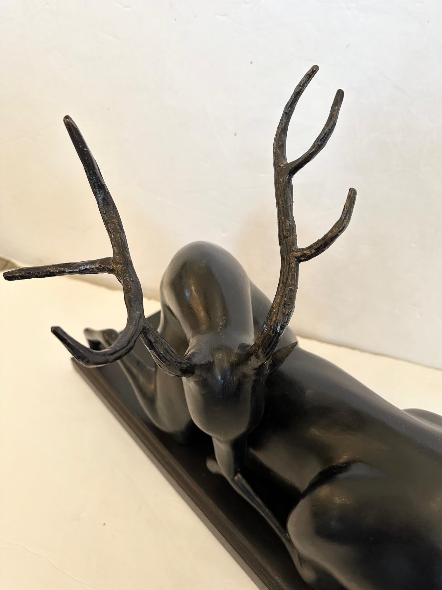 Poetic Iron Sculpture of Recumbent Stag Deer on Wood Base For Sale 2