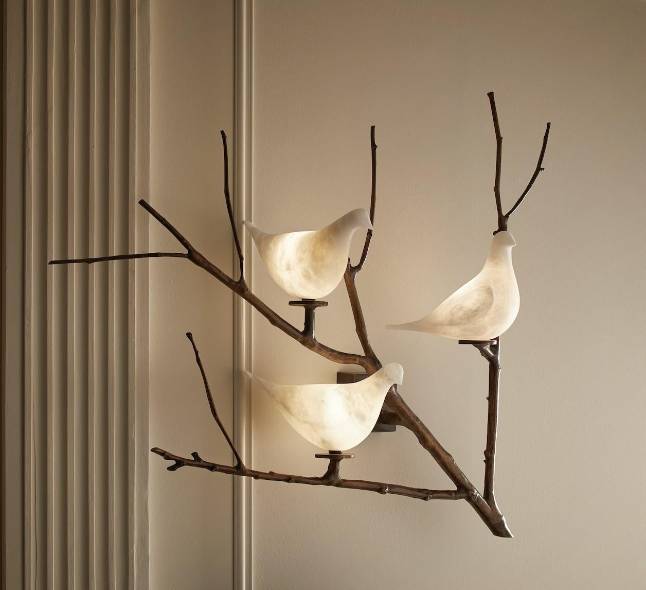 Superb wall light in sculpted and patinated brass with enlightened Doves in alabaster 
2 models available (Branch right or left orientated).
Creation by Studio Glustin