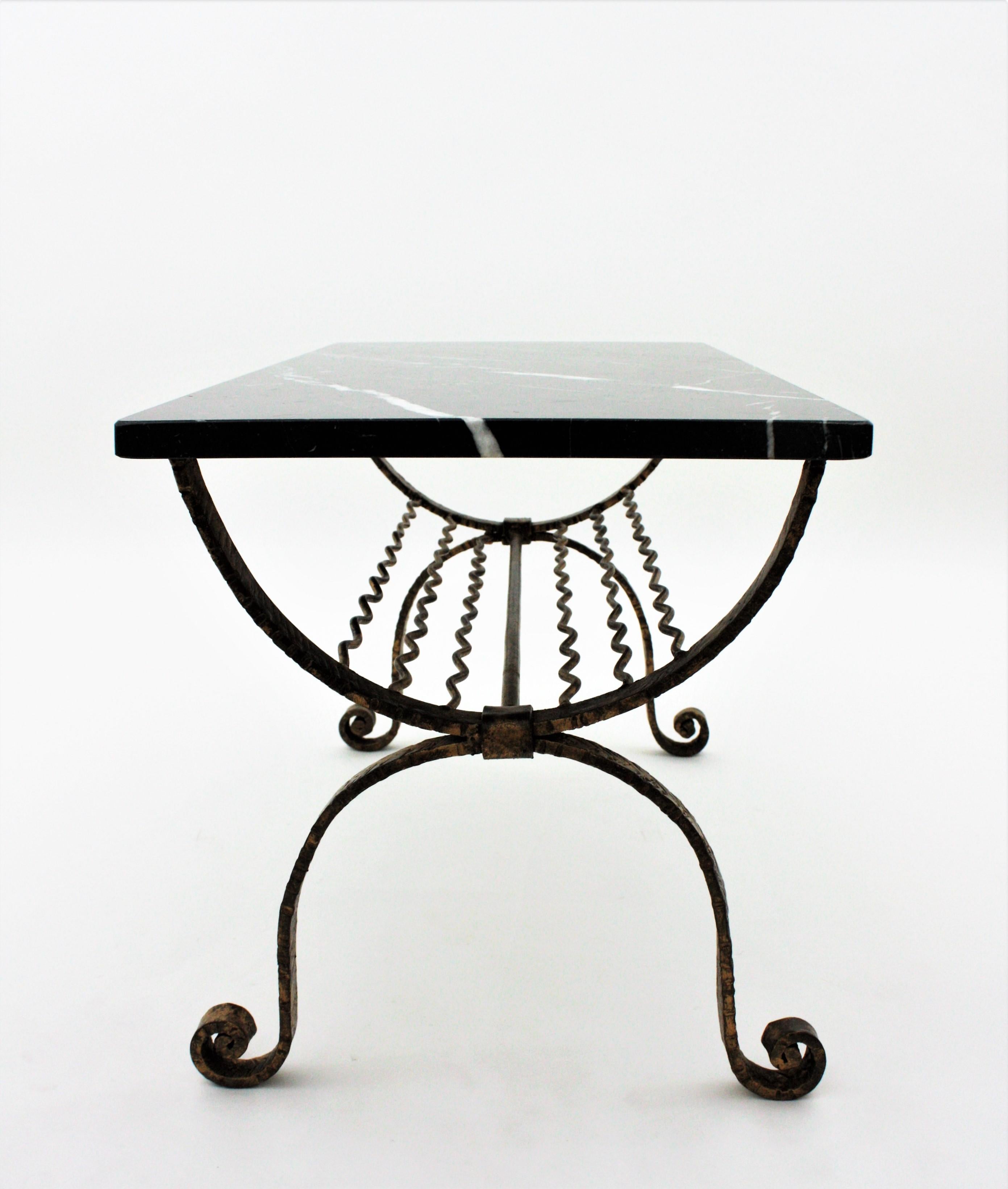20th Century Poillerat Style French Gilt Iron and Marble Table with Magazine Stand, 1940s For Sale