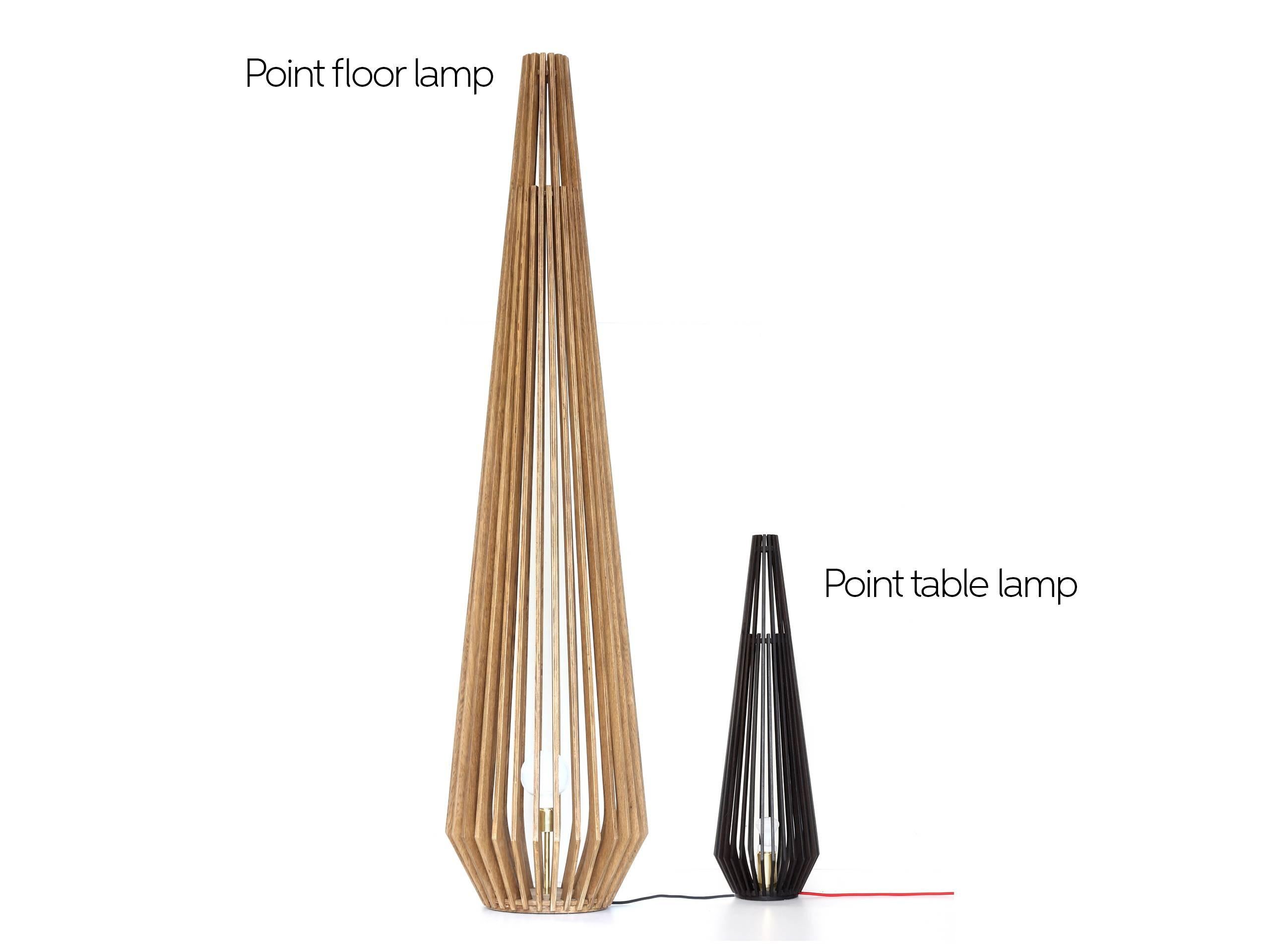 Available in floor and table versions, this piece is made of a sequence of laminated wood slats. Transparency and simplicity are the words that define this lamp.