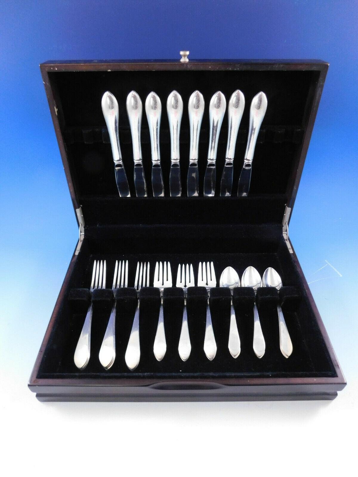 Heirloom quality pointed antique by Reed & Barton / Dominick & half sterling silver flatware set, 32 pieces. This set includes:

8 knives, 9 1/8