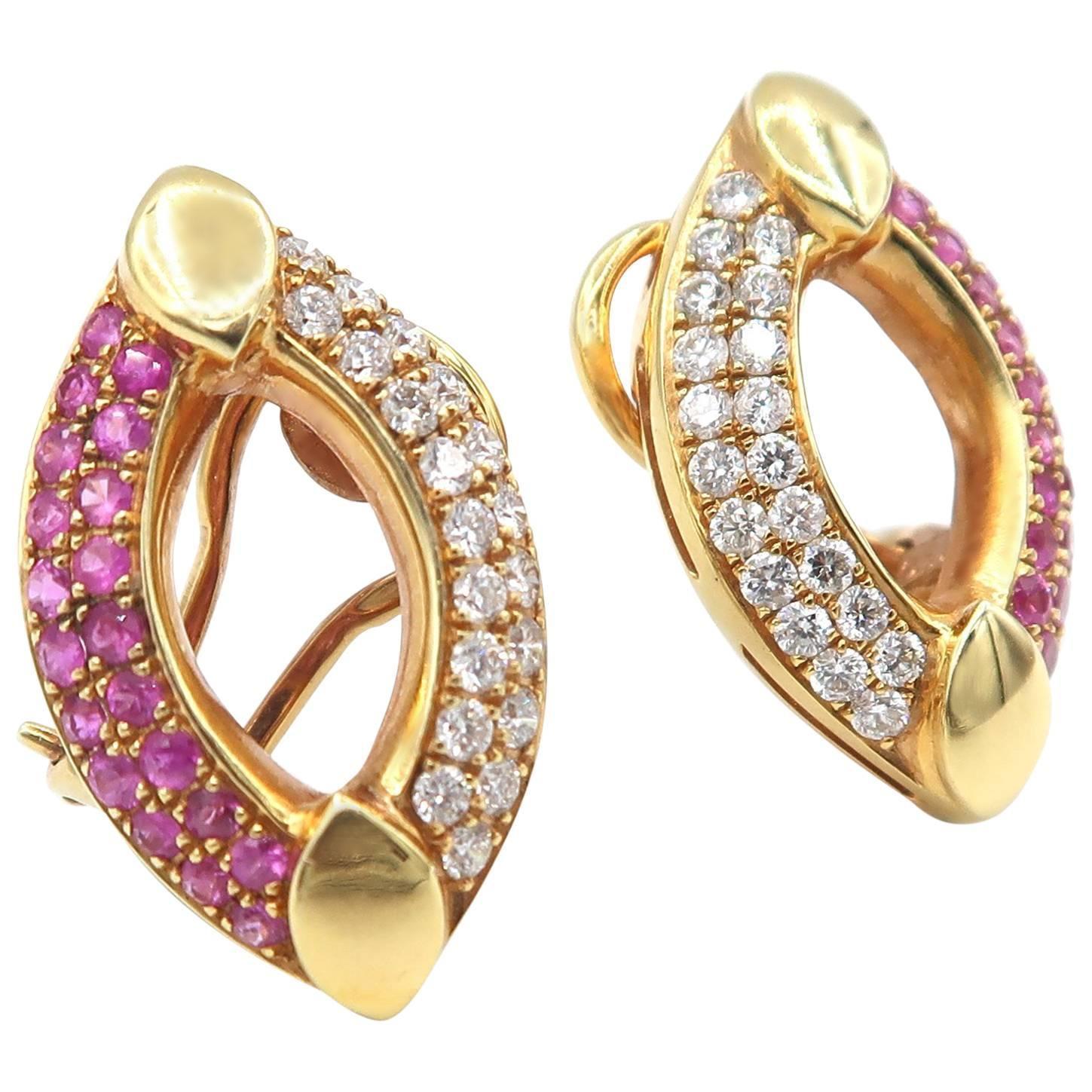 Geometric Shape of Pointed Ellipse Clip-On Earrings in 18K Rose Gold Pavé Set with Pink Sapphires & Diamonds.

Suitable for non pierced ears. 

Pink Sapphire: 1.65 ct
Diamond: 1.04 ct
Gold: 18K Rose Gold, 11.76 g