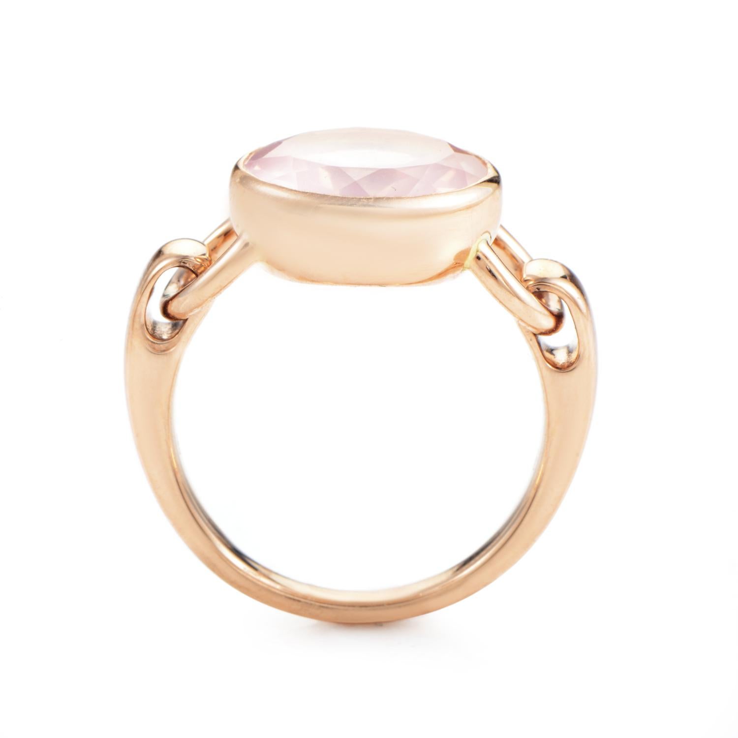 This gently romantic Poiray ring is a precious example of playful glamour. The ring is made of 18K rose gold that is specially designed with hinges for a smooth, movable, bezel setting. A faceted pink quartz totaling ~3.50ct is beautifully