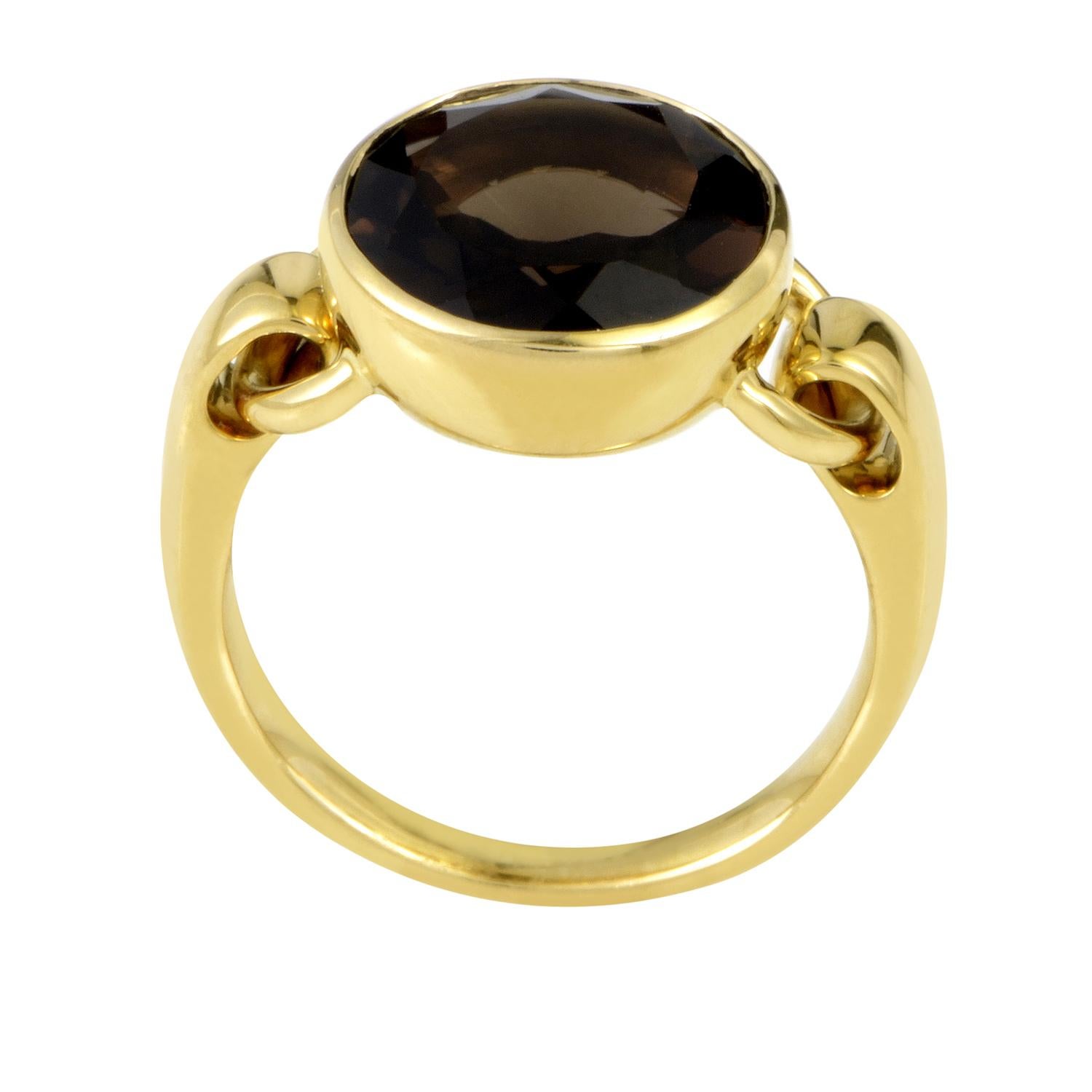 Set upon a gracefully shaped body made of 18K yellow gold that exudes classic elegance and tasteful luxury, the smoky quartz in this astonishing ring from Poiray weighs 3.50 carats and offers a majestic look.
