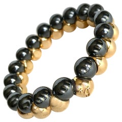 Vintage Poiray Bracelet in 18 kt Yellow Gold and Hematites