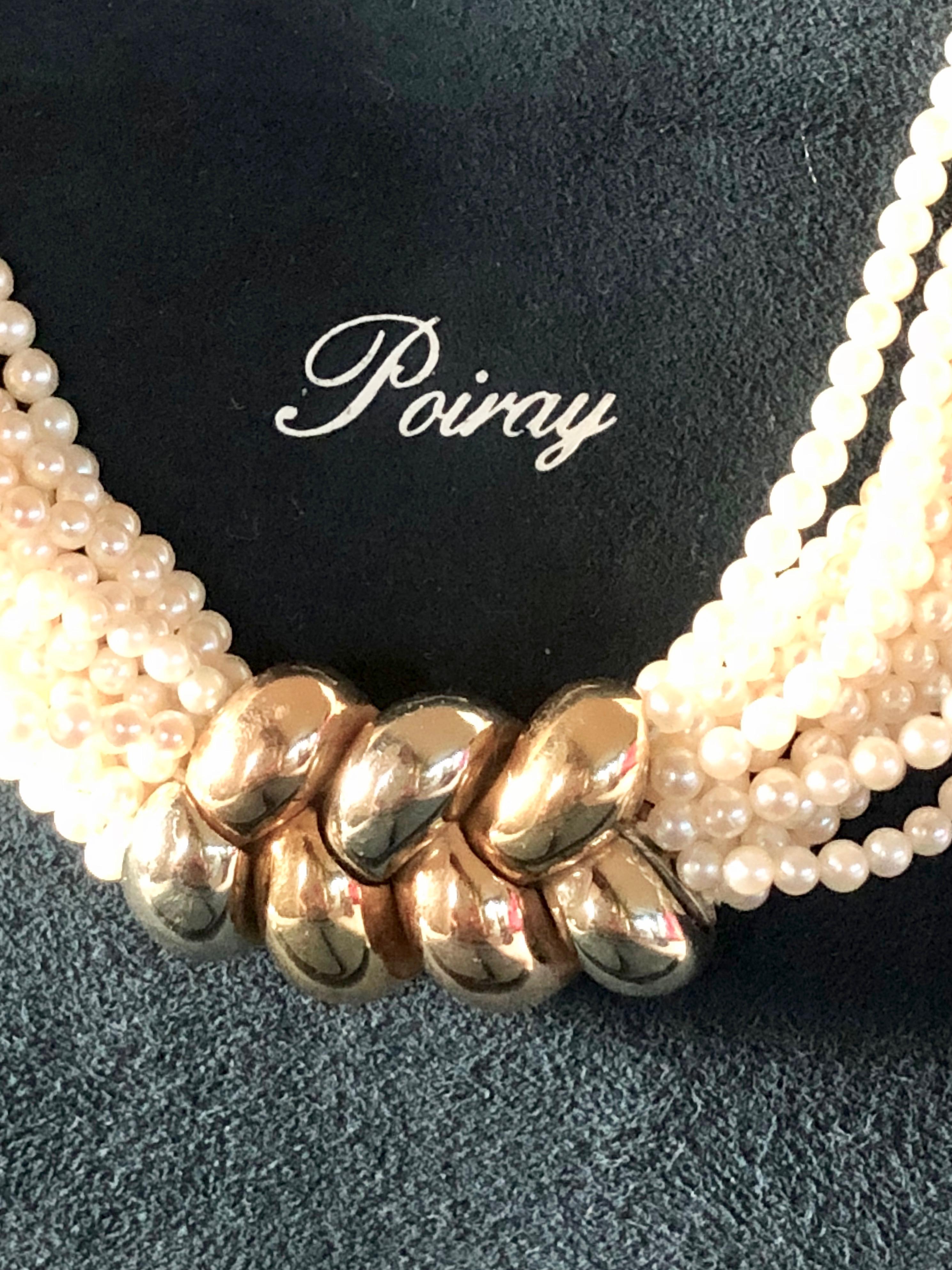 Elegant and timeless torsade necklace made of 15 strands of Akoya pearls. 
Features a 18K gold (yellow, white, pink) clasp with Poiray maker's mark. 
Wrist Lenght: 42 cm
Condition: Very Good
Comes With: Original Poiray pouch 

All items at la Bourse