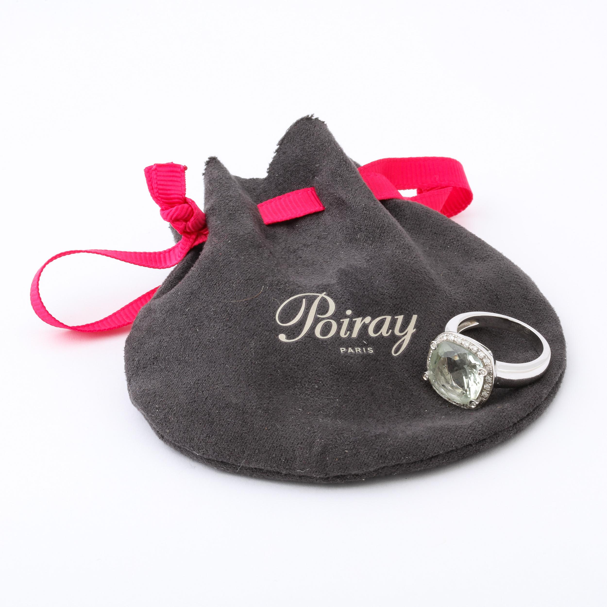 This stunning Poiray of Paris ring is set with a 5 carat Yellow quartz stone with 32 diamonds approximately 22 points all in 18k white gold.It is signed Poiray  and has original suede bag as well.It is currently a size 7 but the purchaser can size