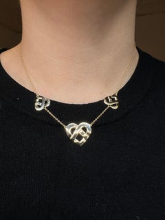 Ciondolo Poiray 3 "Coeur Entrelacé" Oro Rosa