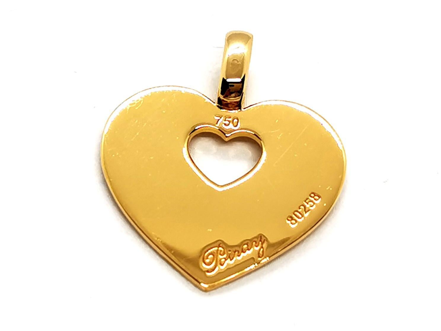 Pendant yellow gold 750 thousandth (18 carats) Poiret. model secret heart number 80258. width: 2 cm. height: 23.5. hallmark owl. total weight: 4.23 g. excellent condition

