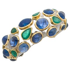 Retro Poiray Sapphire, Emerald, Yellow gold and Silver Bangle Bracelet