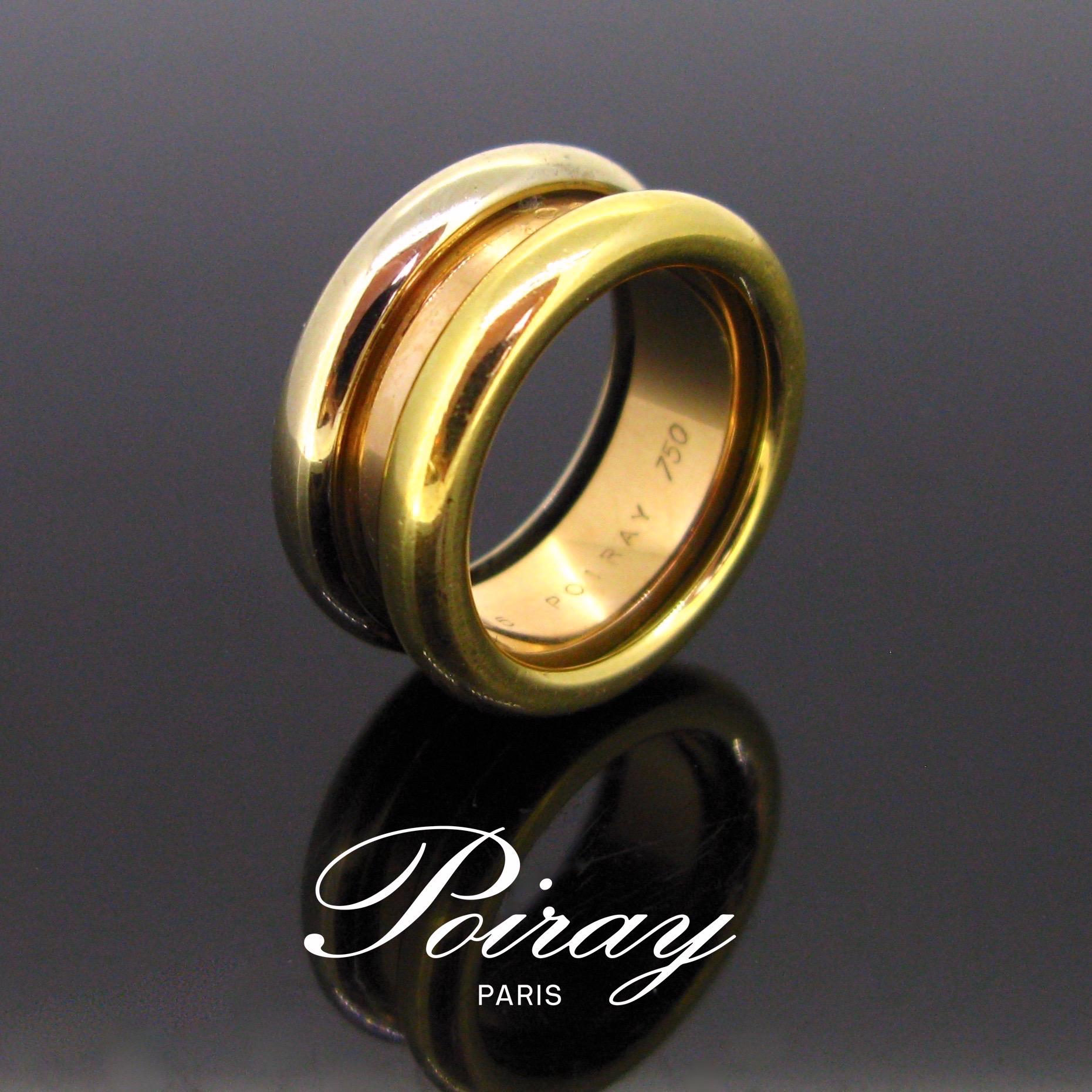 This ring is signed Poiray. It is made in 18kt gold with three colours : Yellow, Rose and White. The gold is smooth and shiny. It is in very good condition. It is signed and numbered inside the ring band. We can see also the maker’s mark and the