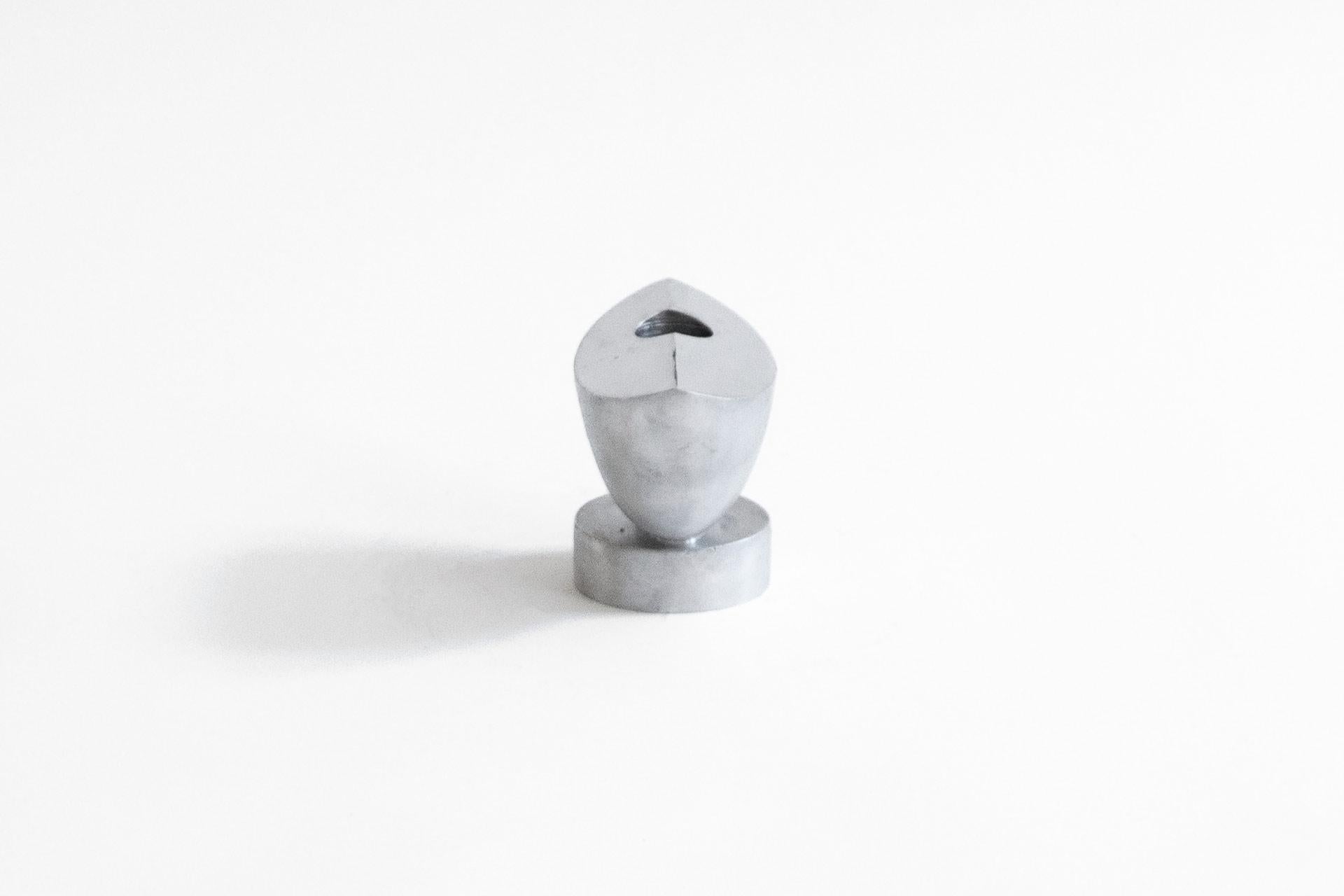 The Poise candle holder is designed to bring light, balance and grace. A subtle statement piece that seemingly allows the light to float, but always holding it solidly in place – a small sculpture in its own right. Poise is sand cast in aluminium