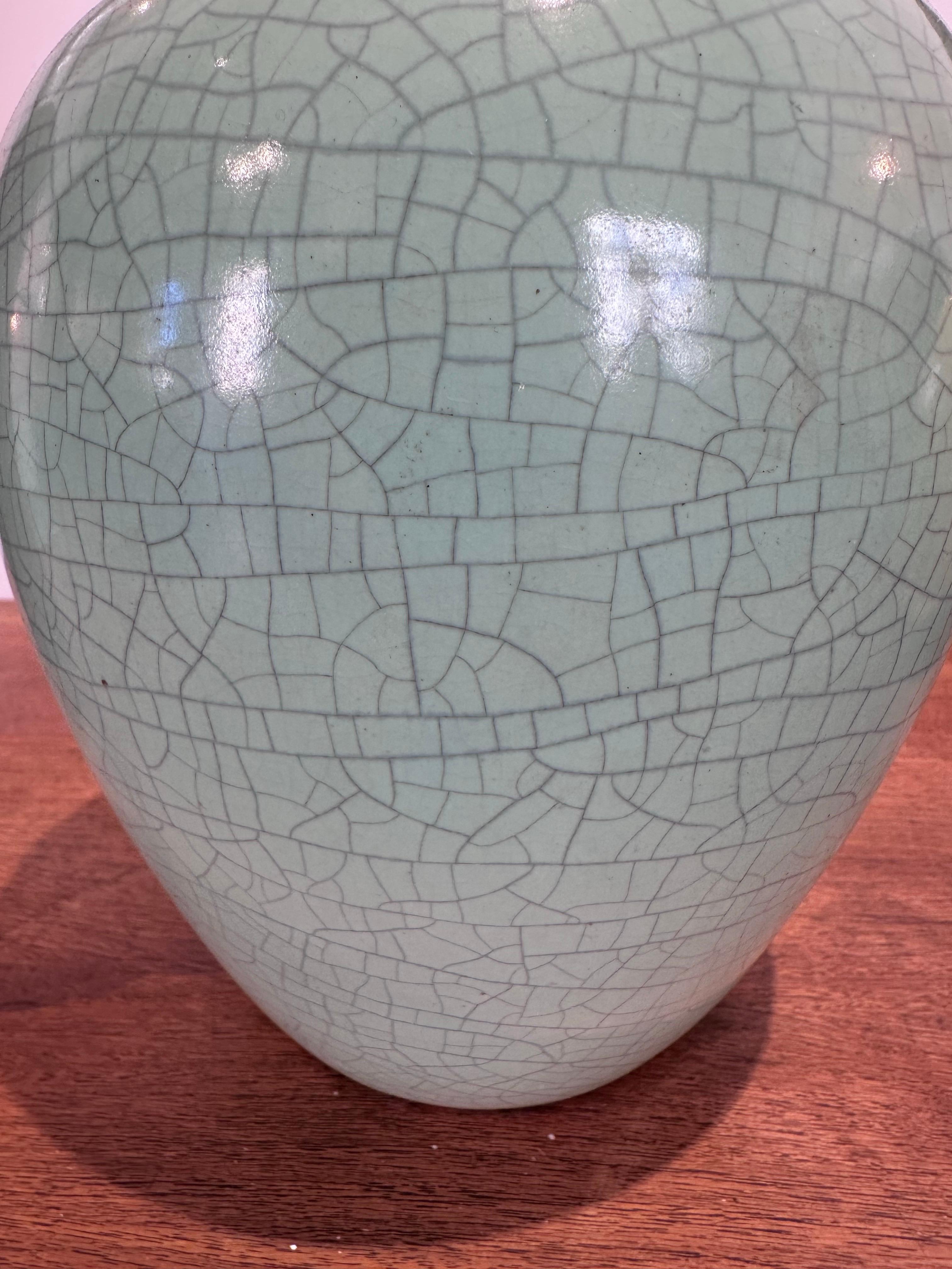 Pol Chambost ceramic, old production from the 50s. Green crackled enamel. Perfect condition

height  26 cm diameter 18 cm
