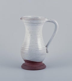 Pol Chambost, France. Ceramic pitcher with gray-toned glaze.