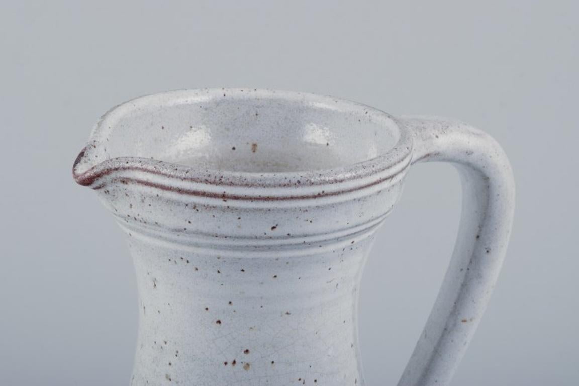 French Pol Chambost, France. Ceramic pitcher with gray-toned glaze.  For Sale