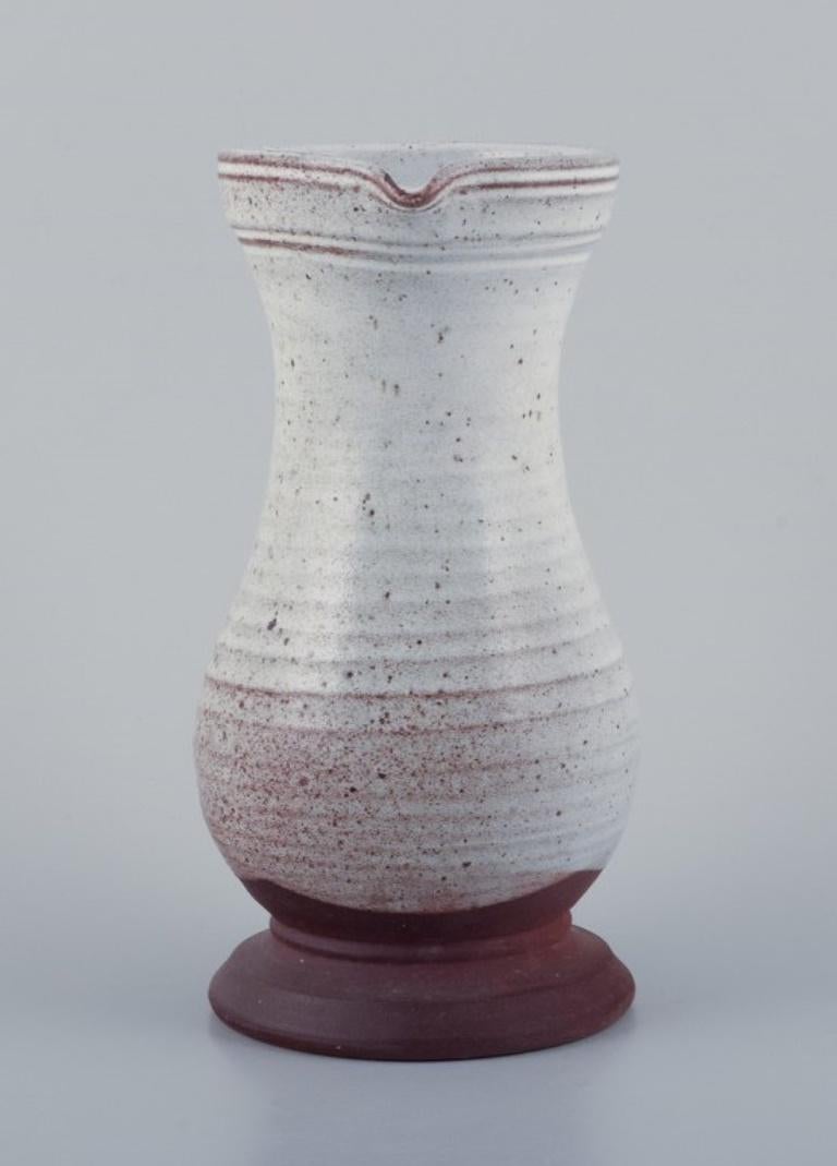 Glazed Pol Chambost, France. Ceramic pitcher with gray-toned glaze. For Sale