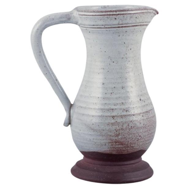 Pol Chambost, France. Ceramic pitcher with gray-toned glaze. 