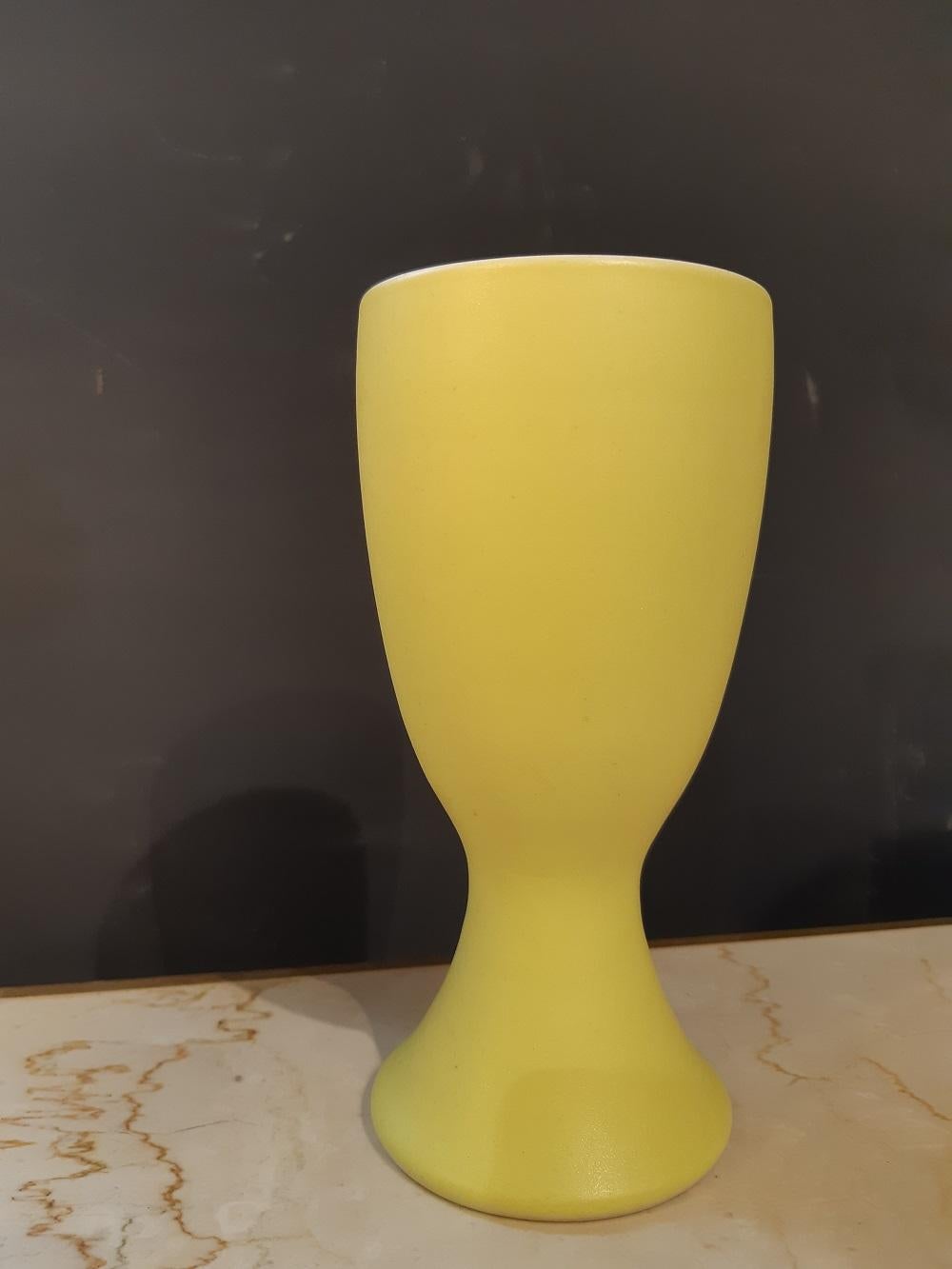 Pol Chambost French ceramic 1950 Mid-Century Modern

A yellow mazagran by Pol Chambost N°1064
White inside.
Signed on the reverse
Measures: Height 17cm, width 8cm.

Good condition.