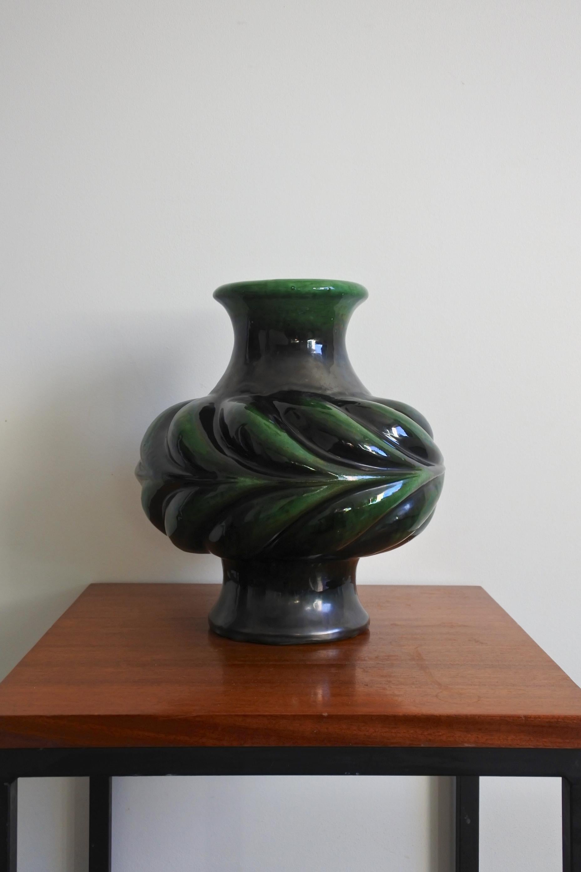 Scarce glazed ceramic vase by renowned french pottery artist Pol Chambost.
Model 816, black, green and white glaze.
Made in France in the 1954.
Only 8 exemplars from 1954 to 1957.
Literature: 