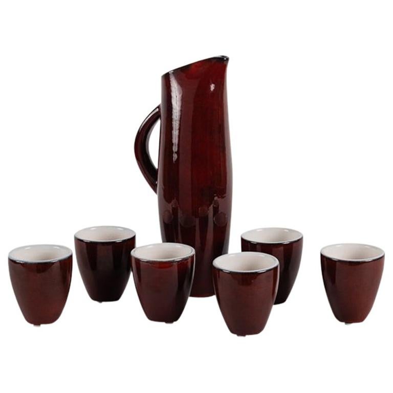 Pol Chambost, Pitcher and Six Cups with Red and White Glaze, France, 1972