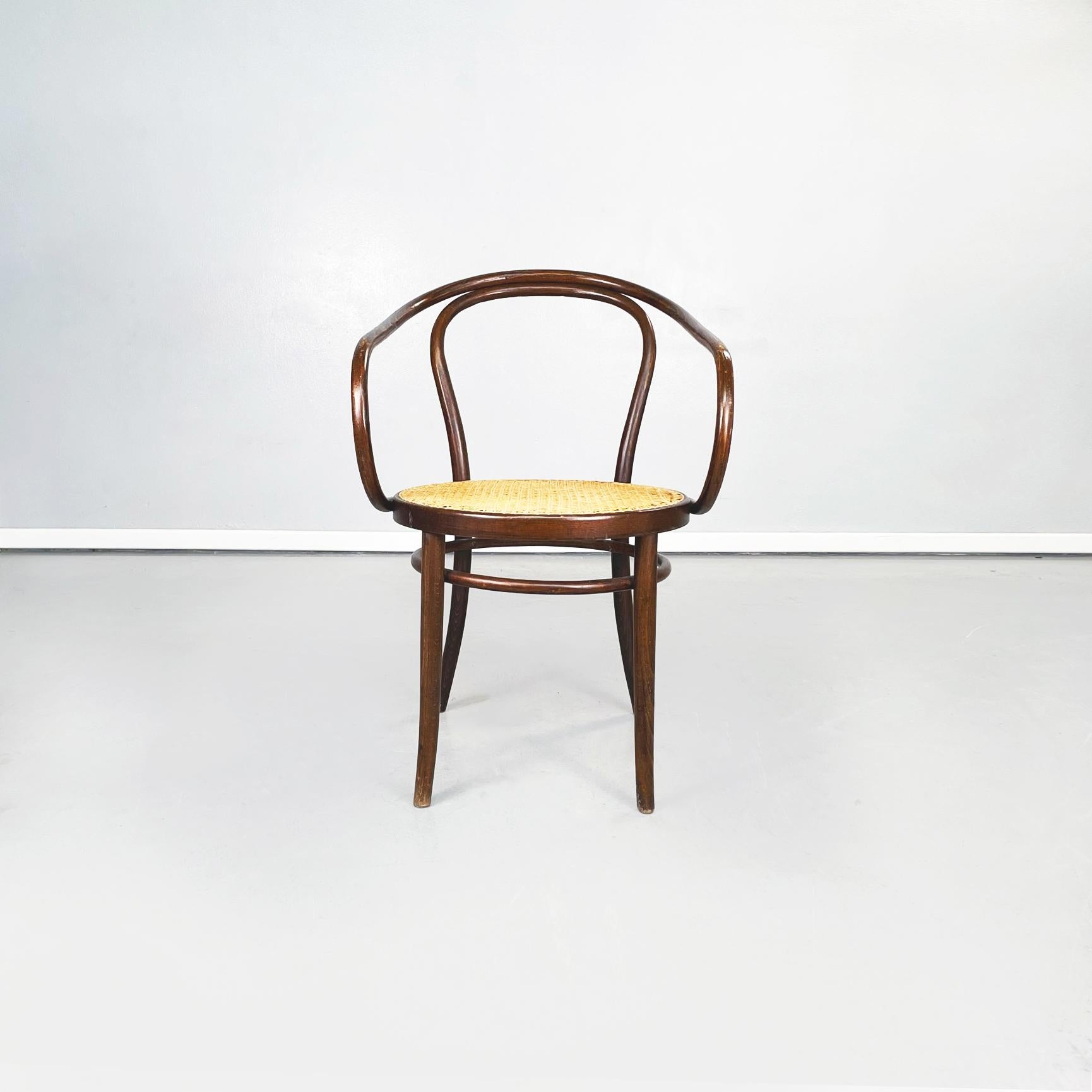Poland mid-century wooden and straw chair Thonet by ZPM Radomsko, 1960s
Chair mod. Thonet with round seat in Vienna straw. The structure, in wood with a curved round section, is made up of backrest, armrests and legs.

Produced by ZPM Radomsko in