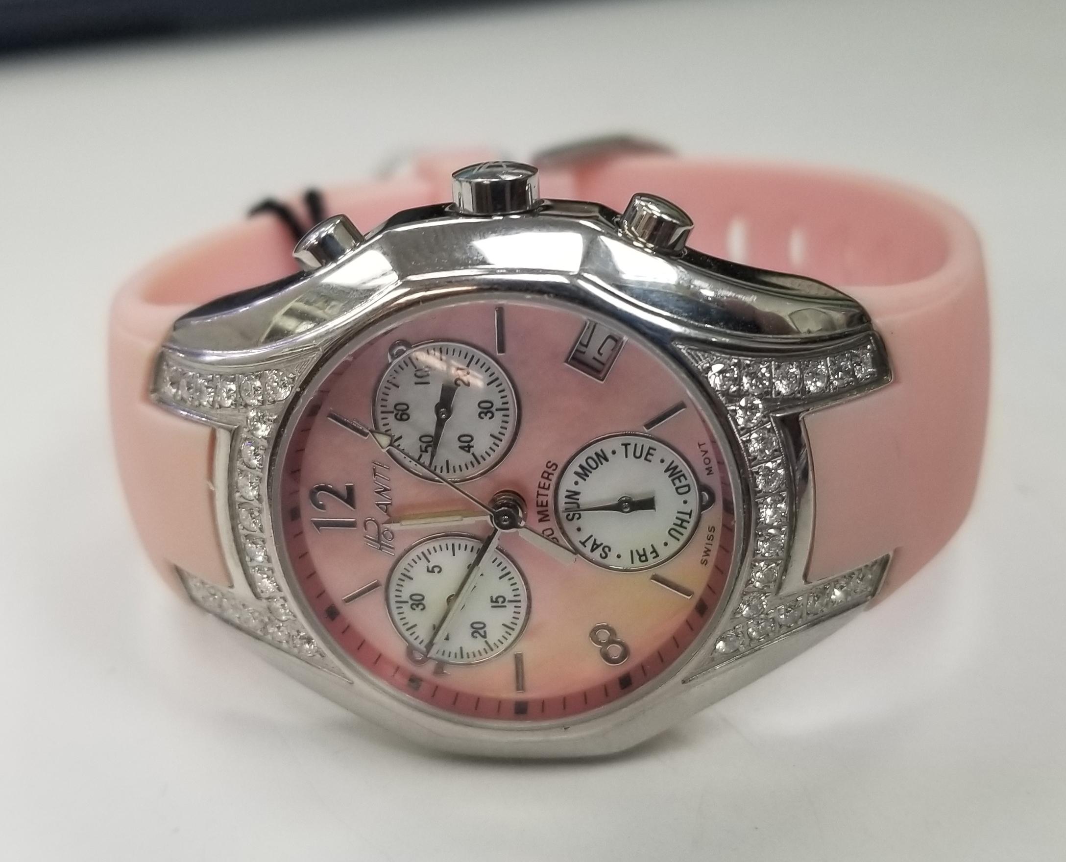 Brand: Polanti
Water resistance: 100 Meter
Case & Bracelet: Stainless Steel Case and Rubber Strap
Clasp: Tang Buckle
Bezel: None
Diamonds: 38
Crystal: Sapphire crystal
Dial: Pink Mother on Pearl
Date: At 4 O'clock
Case Depth: 10mm
Case Diameter: