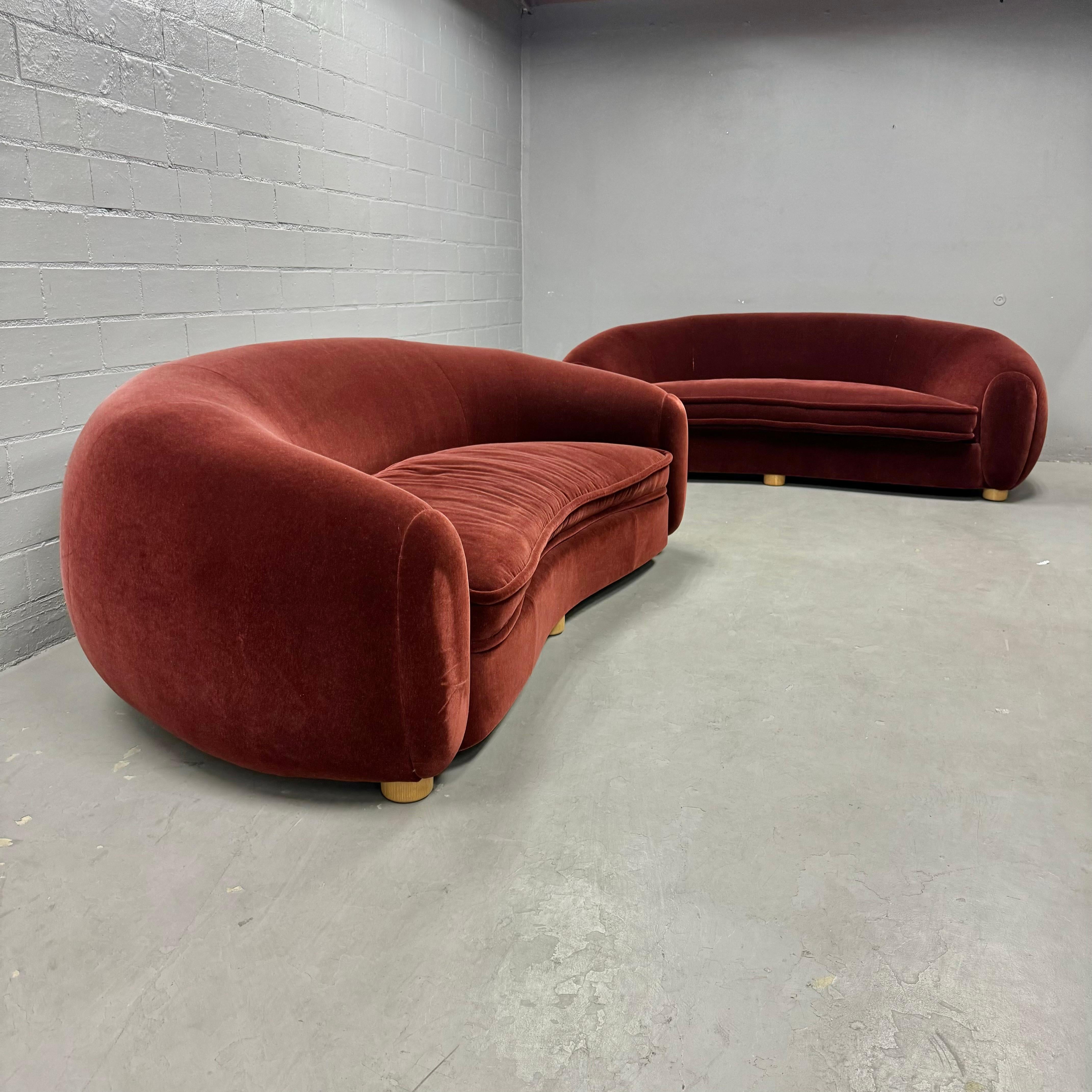 Extremely elegant and posh Art Deco inspired sofa in the style of the classic Jean Royère Polar Bear. Expertly upholstered by hand by the team at Jonas, New York. This sofa is completely upholstered in a deep maroon wool mohair. The cushions are