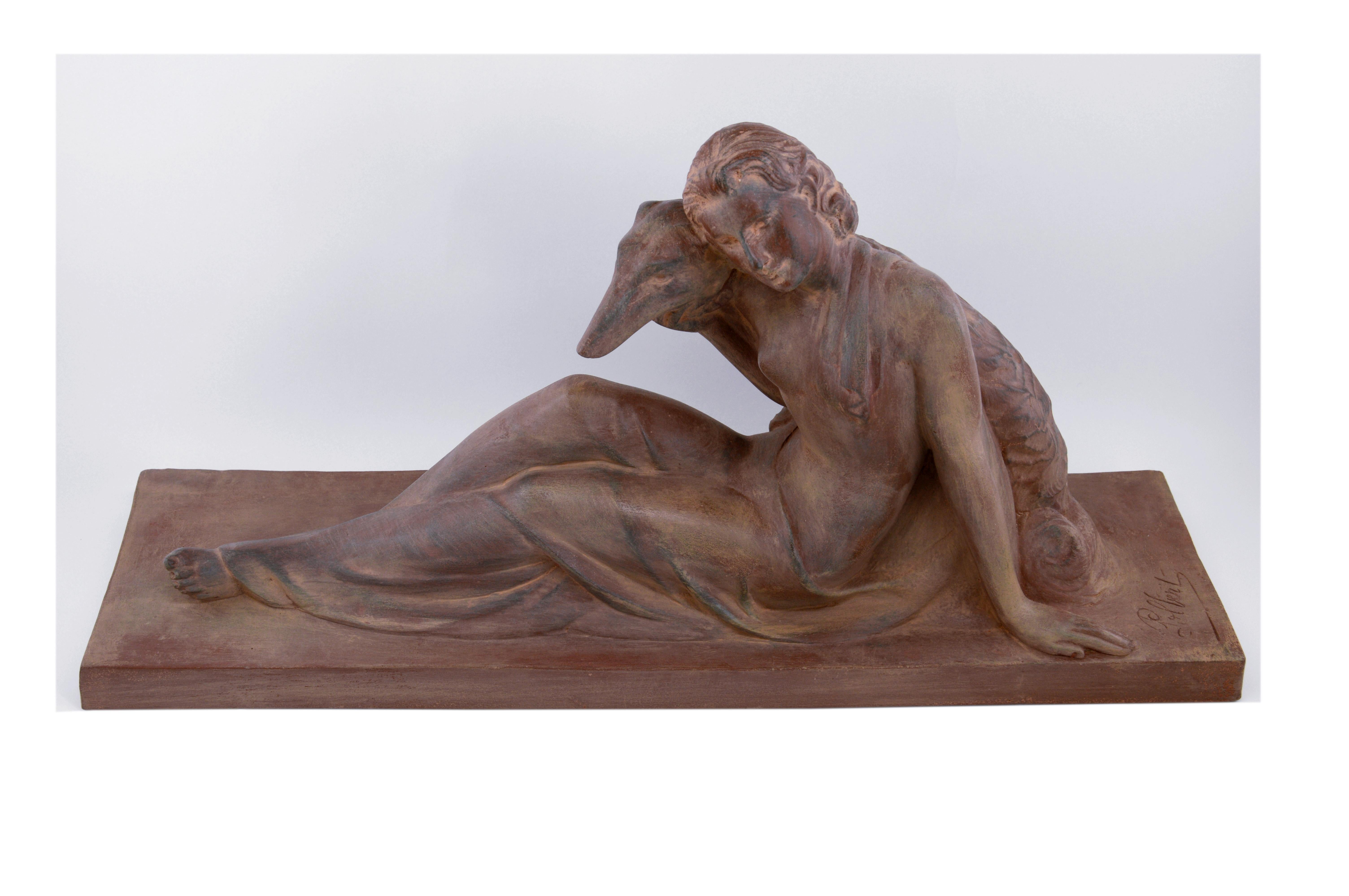 French Art Deco terracotta sculpture by Polbert, France, 1930s. Lady with a greyhound. Measures: Width 21.7