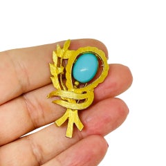 POLCINI signed gold tone faux turquoise cab designer brooch