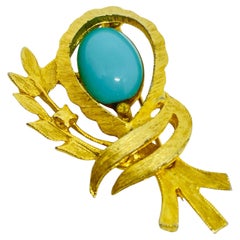 POLCINI signed gold tone faux turquoise cab designer brooch