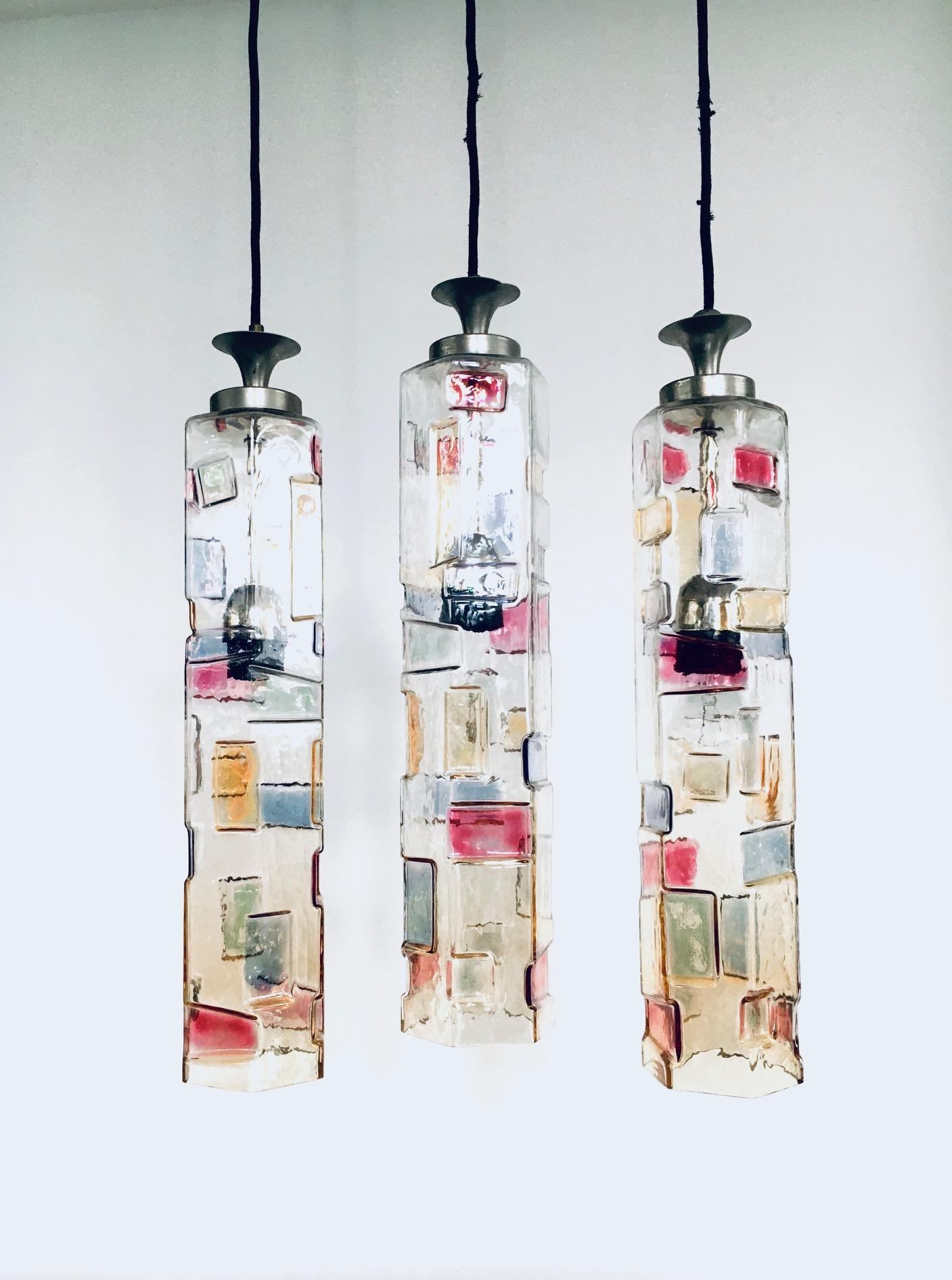 Vintage Midcentury Modern Italian Design Poliarte Colored Glass Pendant Lamp set of 3, Poliarte, Italy 1950's - 1955. Hexagonal glass tube. 3 Dimensional with colored patterns. Very RARE Lamps. 3 seperate hanging lamps. All original glass with