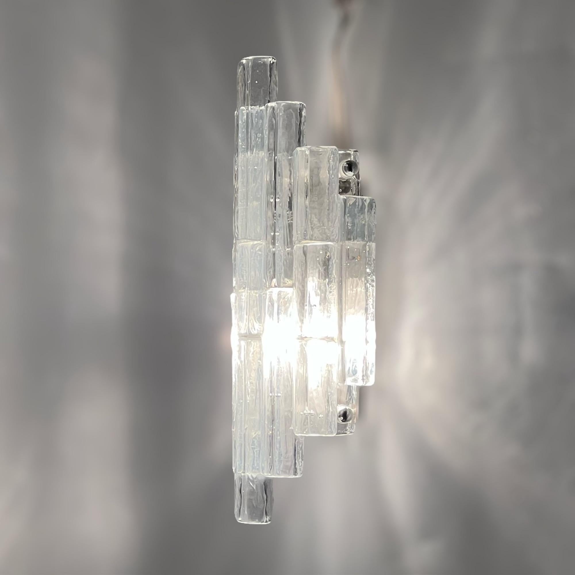 Step into the enchanting world of vintage 70s lamps with this exquisite Albano Poli 'Linea' Wall Lamp, a timeless piece produced by Poli Arte Verona. Crafted in the 1970s, this sconce is a testament to the era's design innovation and Albano Poli's