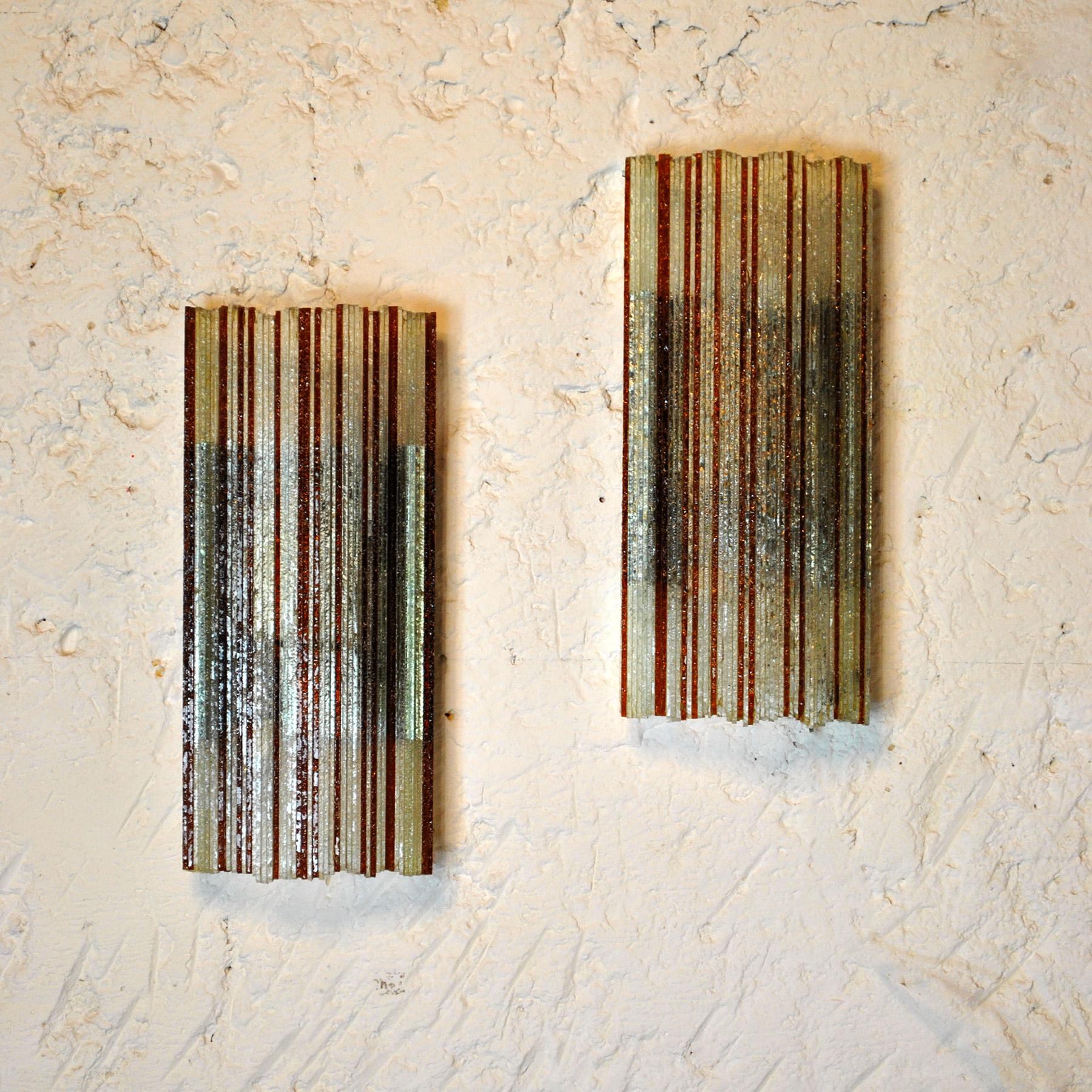 A pair of Brutalist sconces by Poliarte Italy from the sixties.
