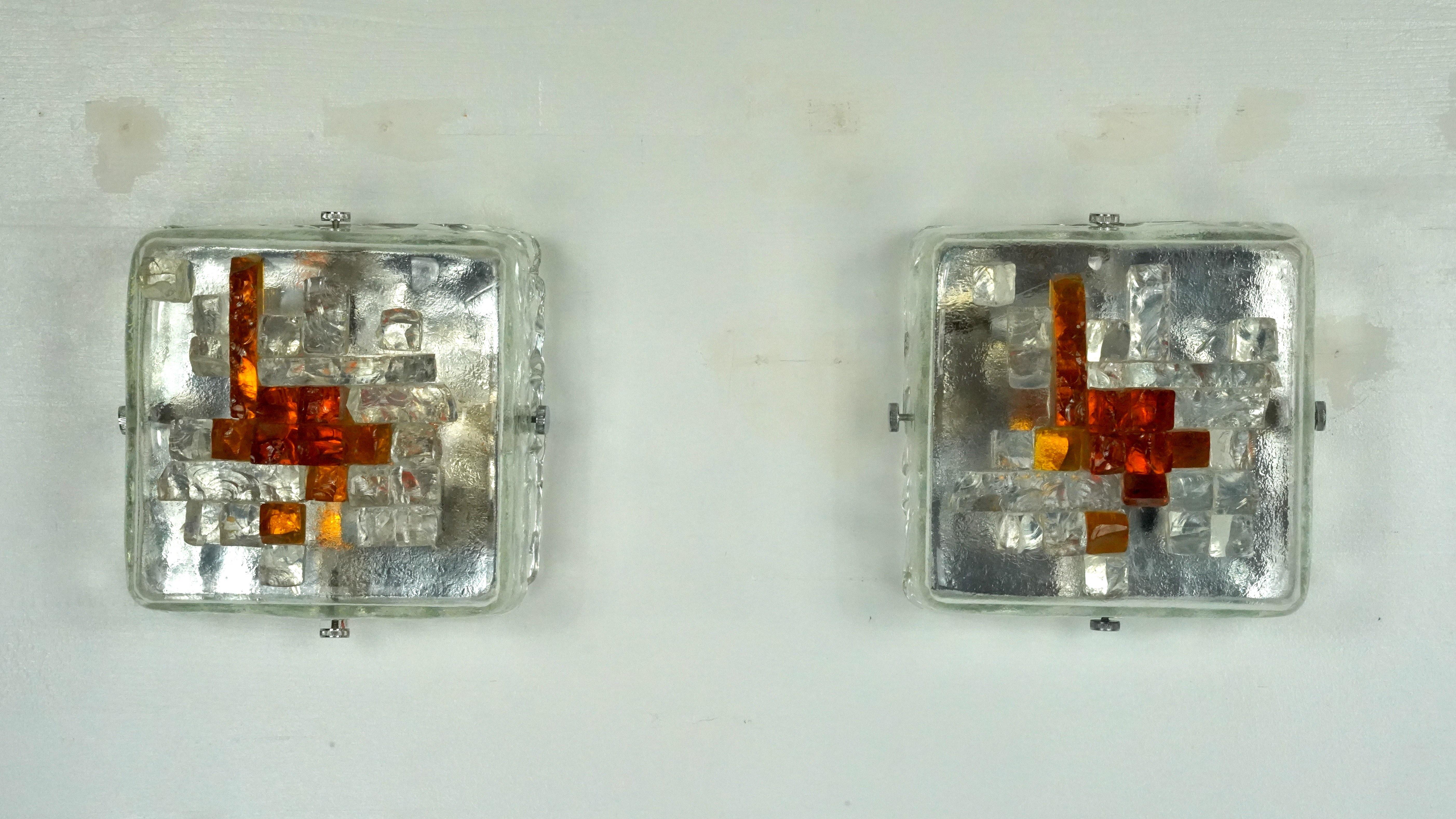 Rare set of two wall lams manufactured in Italy by Poliarte during the 70s. Great vintage condition with no cracks or chips. Normal trace of age and use on the chrome. Full working with EU standard, adaptable on demand for USA standard.