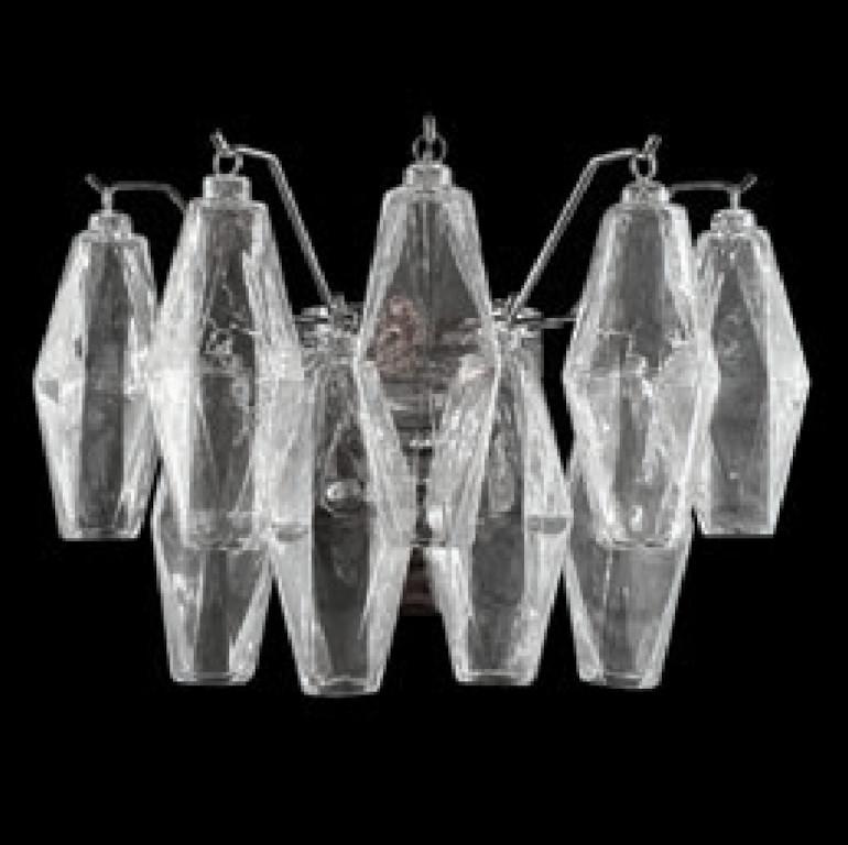 Applique moderna italiana con vetri di Murano trasparenti a forma di poliedro, montati su una struttura in metallo cromato / Made in Italy by FABIO LTD
Larghezza: 14 pollici / Altezza: 9 pollici
2 luci / tipo E12 o E14 / max 40W ciascuna
Riferimento